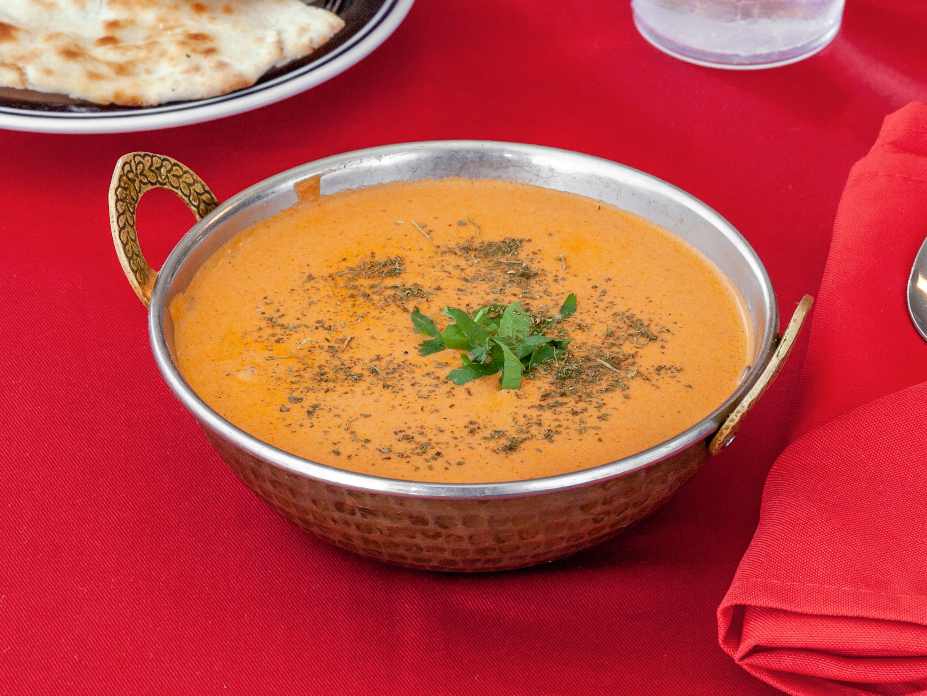 Order 77. Butter Chicken food online from Ambar Indian Restaurant store, Champaign on bringmethat.com