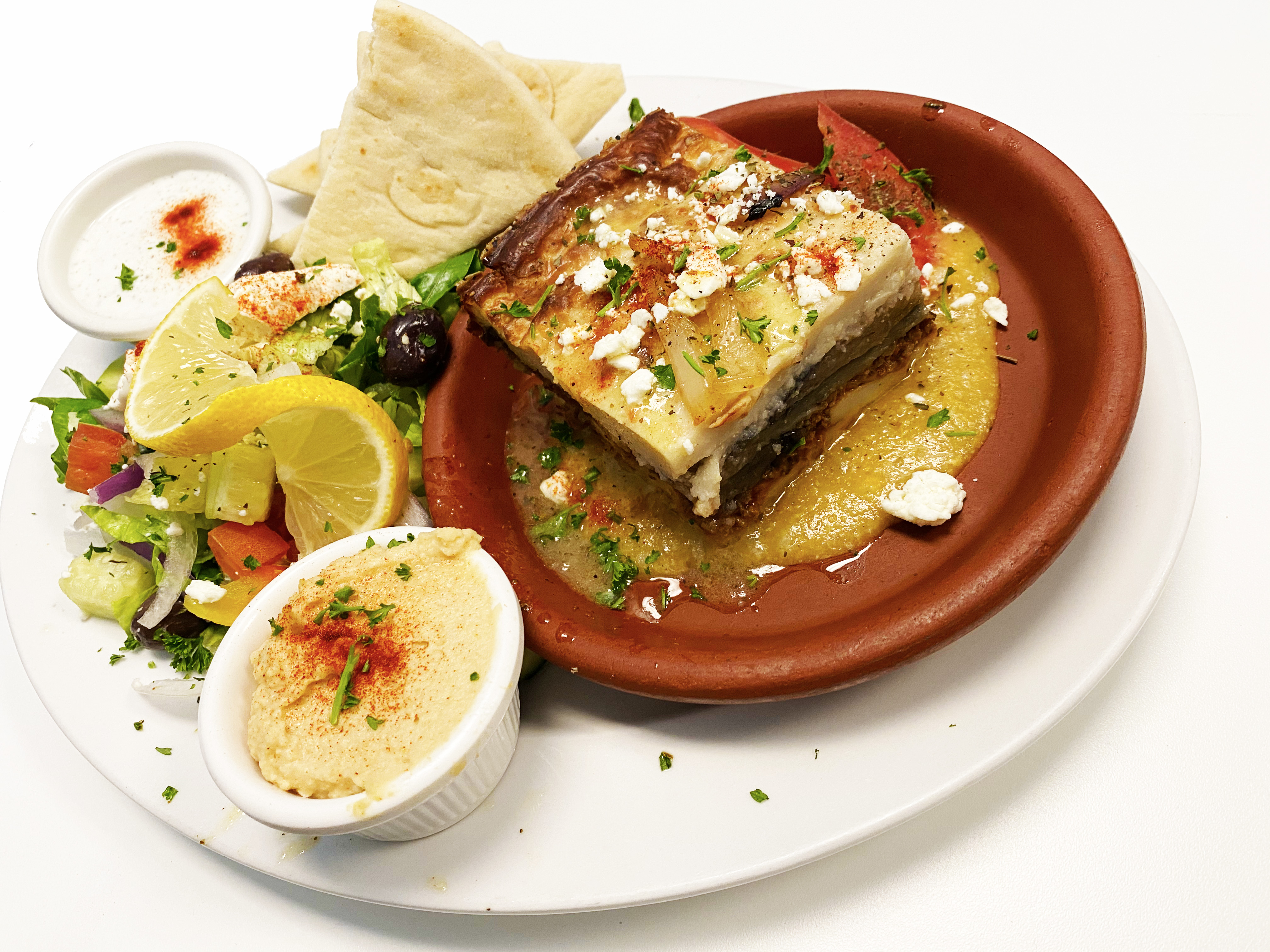 Order Mousaka food online from Santorini Gyro Greek Food store, Cathedral City on bringmethat.com