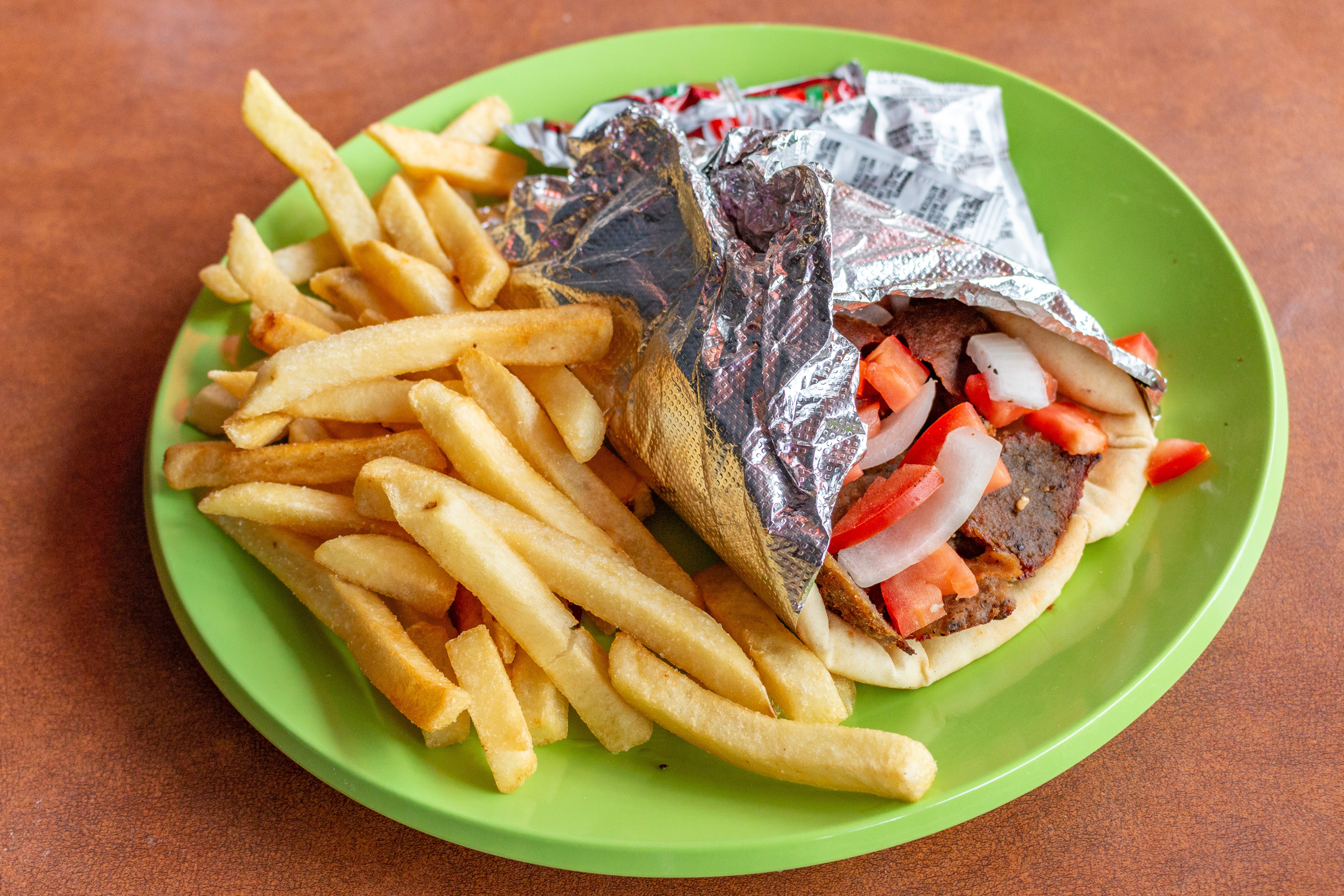 Order Gyro with Fries - Gyro food online from Famous Pizza store, Denver on bringmethat.com