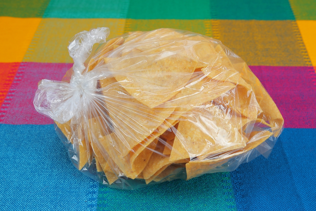 Order Tortilla Chips food online from Refried Beans store, New York on bringmethat.com