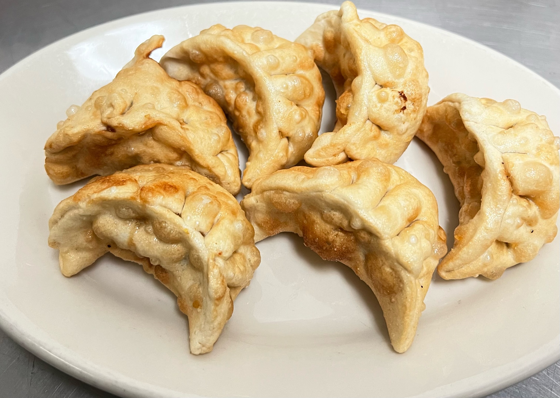 Order Pot Stickers (6) food online from Fortune Cookie store, Oakland on bringmethat.com