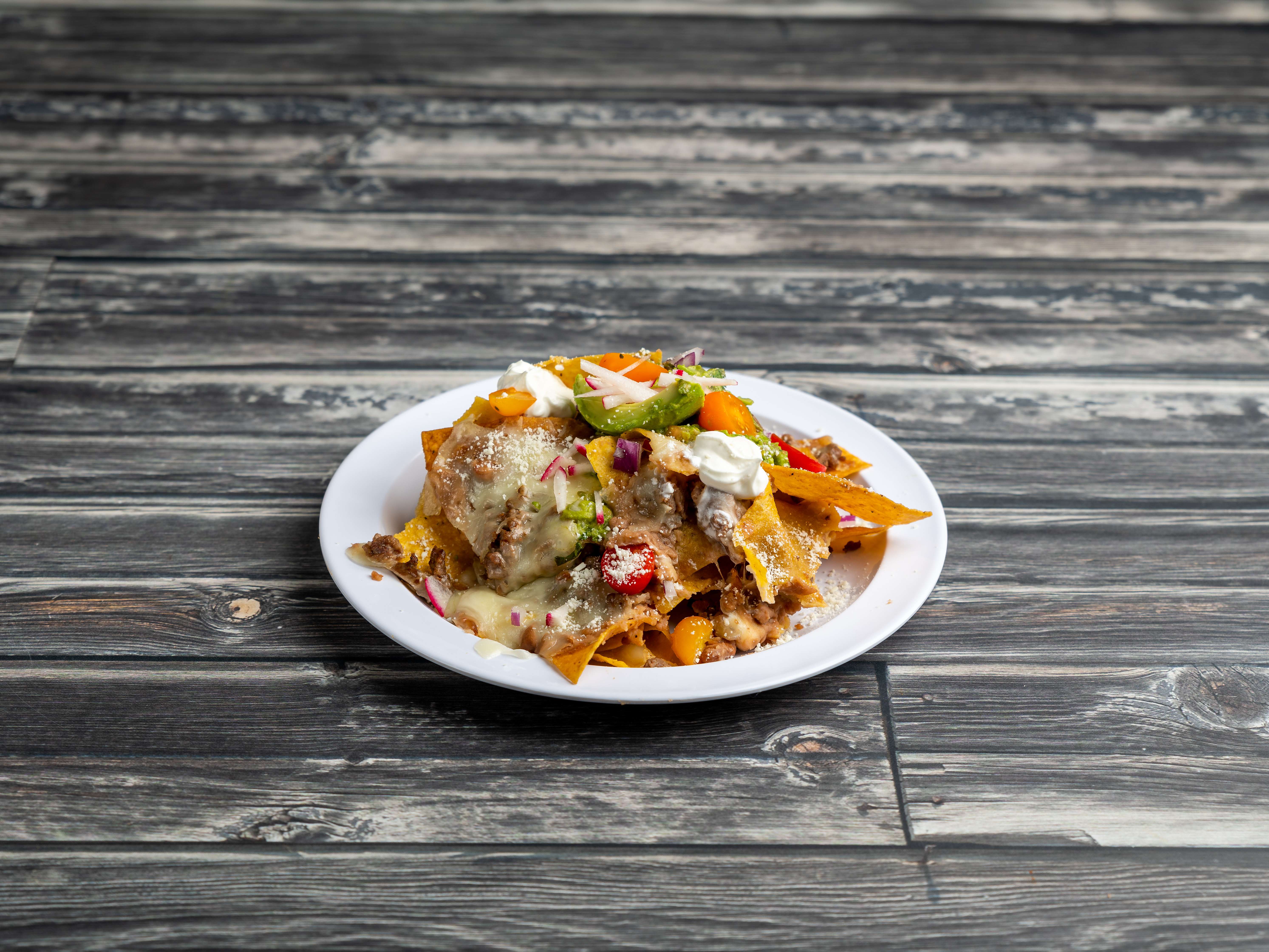 Order Nachos food online from Cilantro Taco House store, Chicago on bringmethat.com