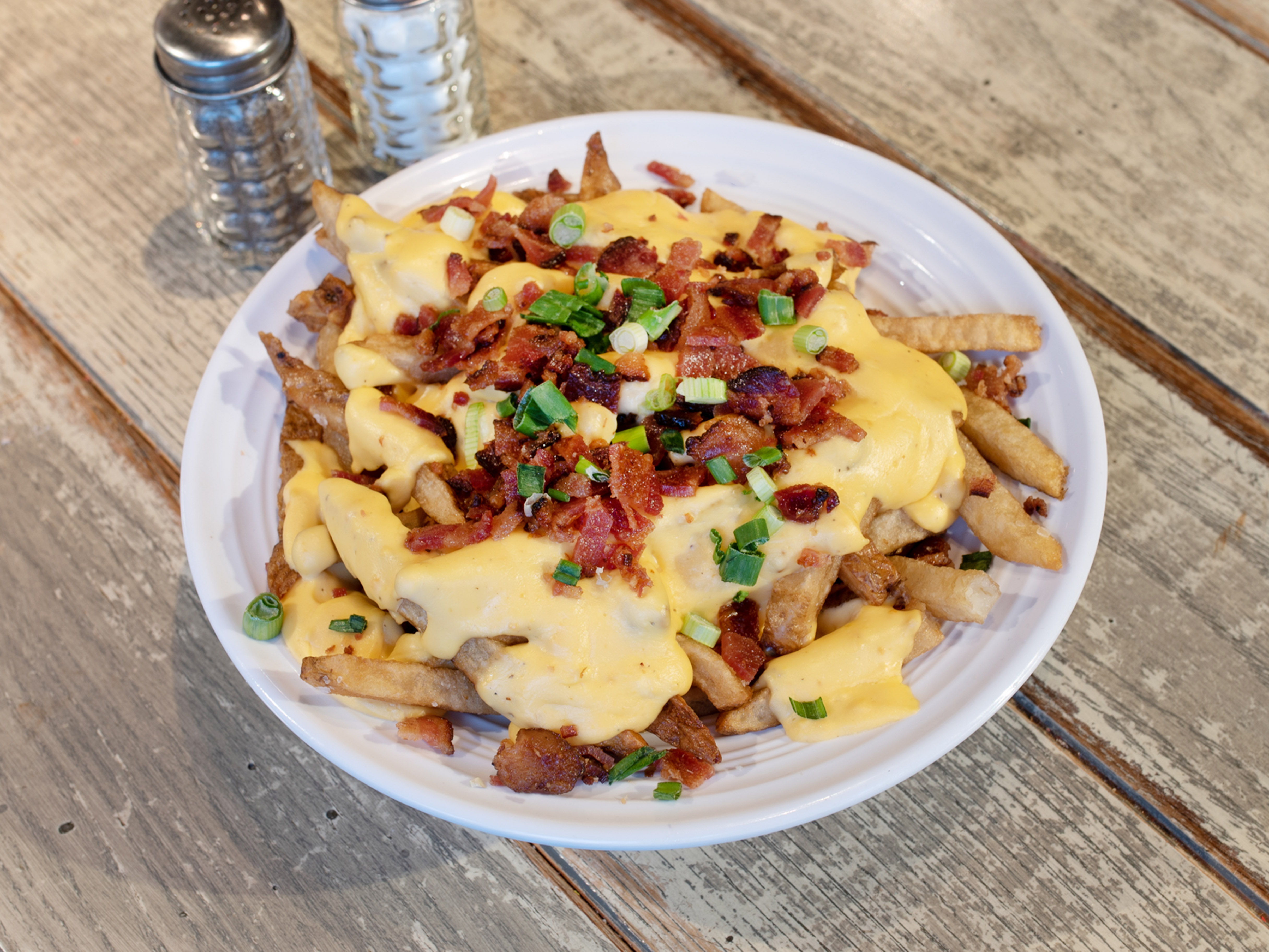 Order Loaded Fries food online from Burgerology store, Patchogue on bringmethat.com