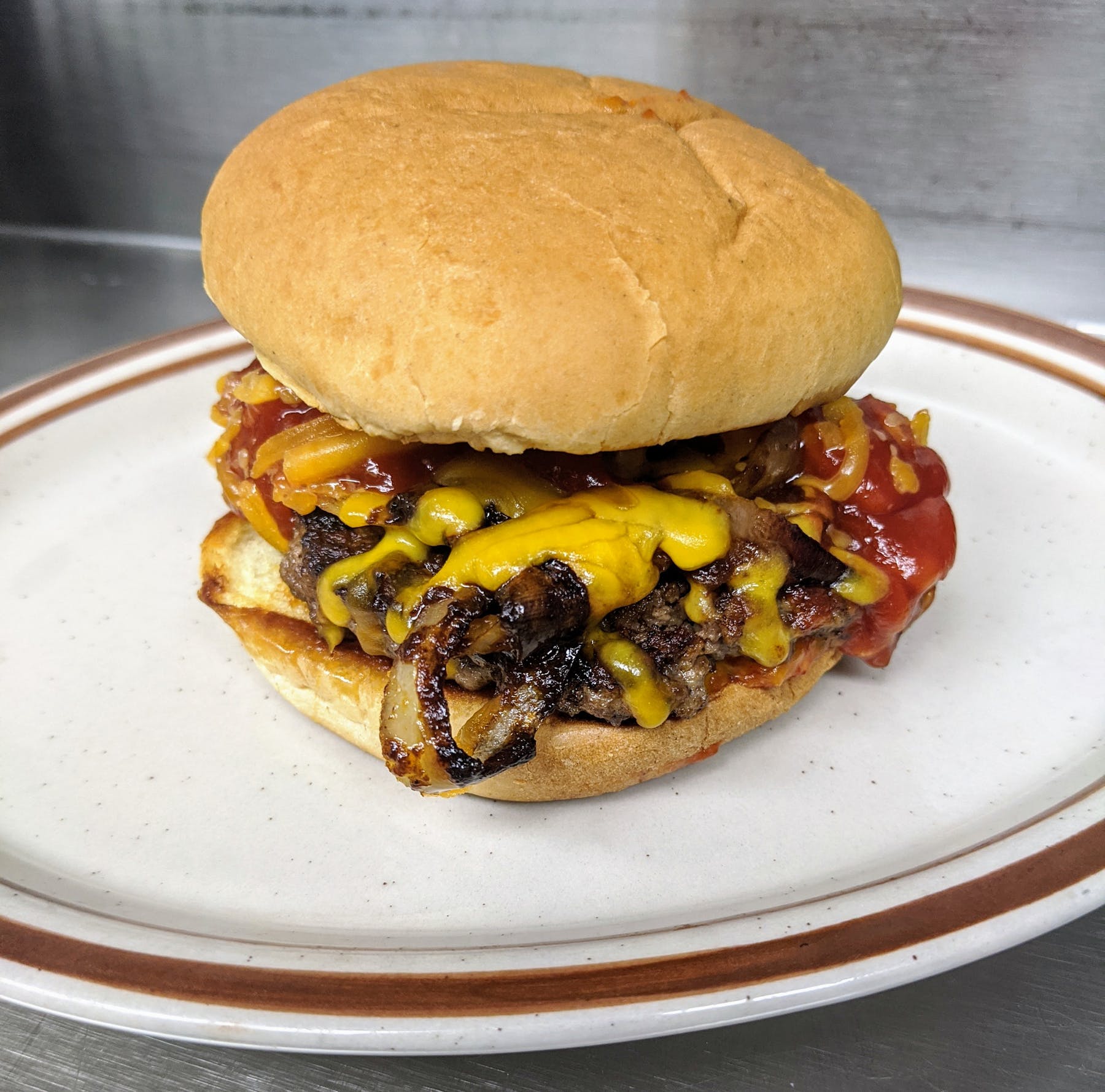 Order Smoky BBQ A1 Burger food online from Tommy West Restaurant store, Cedar Rapids on bringmethat.com