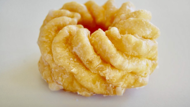 Order Glaze French Cruller food online from Highland Donuts store, Bakersfield on bringmethat.com