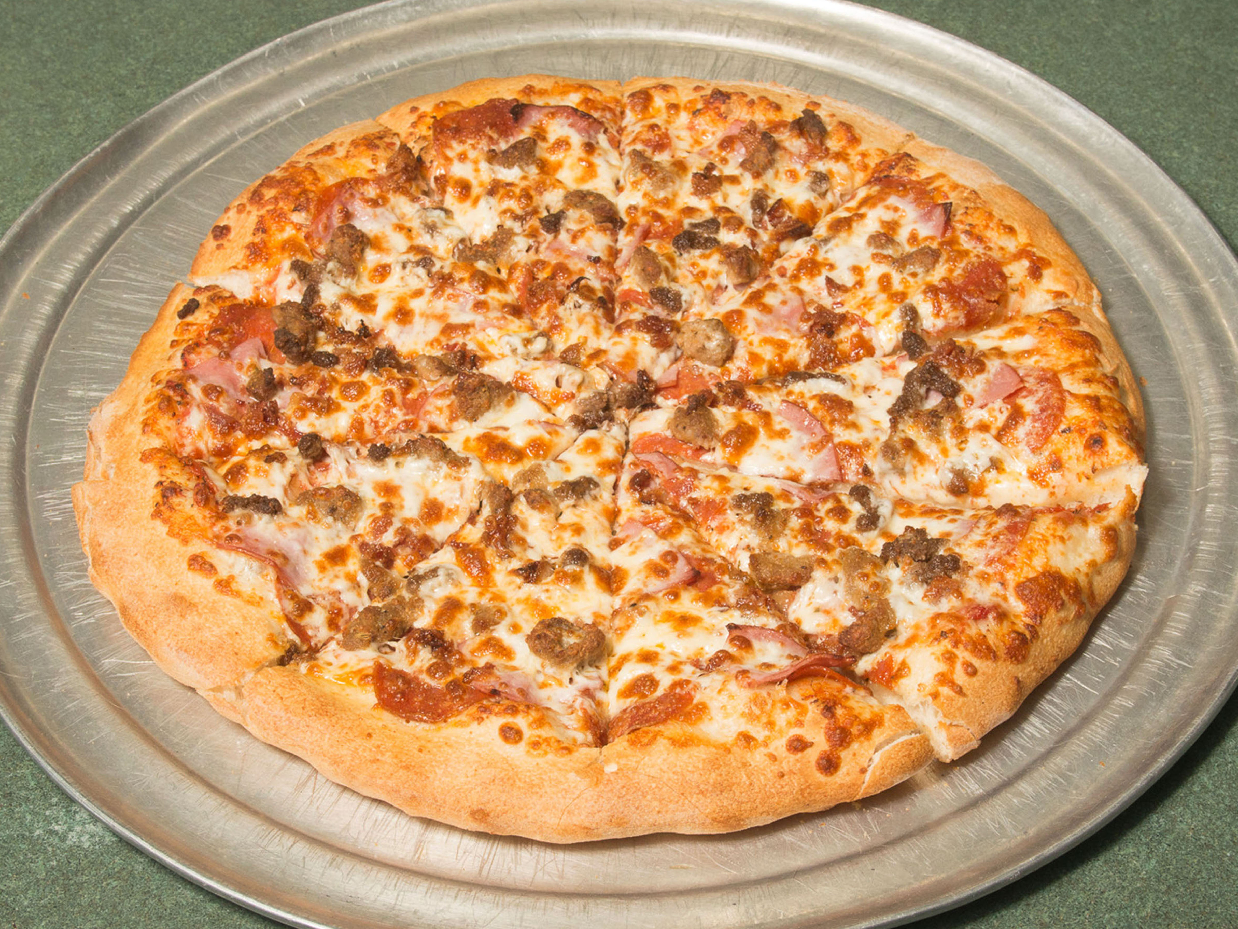 Order Meats Pizza food online from Pizza Street store, Loveland on bringmethat.com