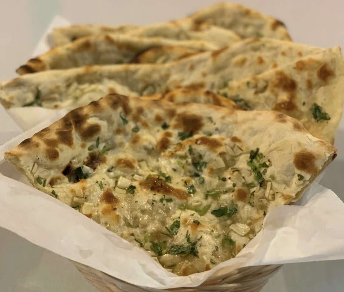 Order Garlic Naan food online from Annapurna Curry And Sekuwa House store, Manchester on bringmethat.com