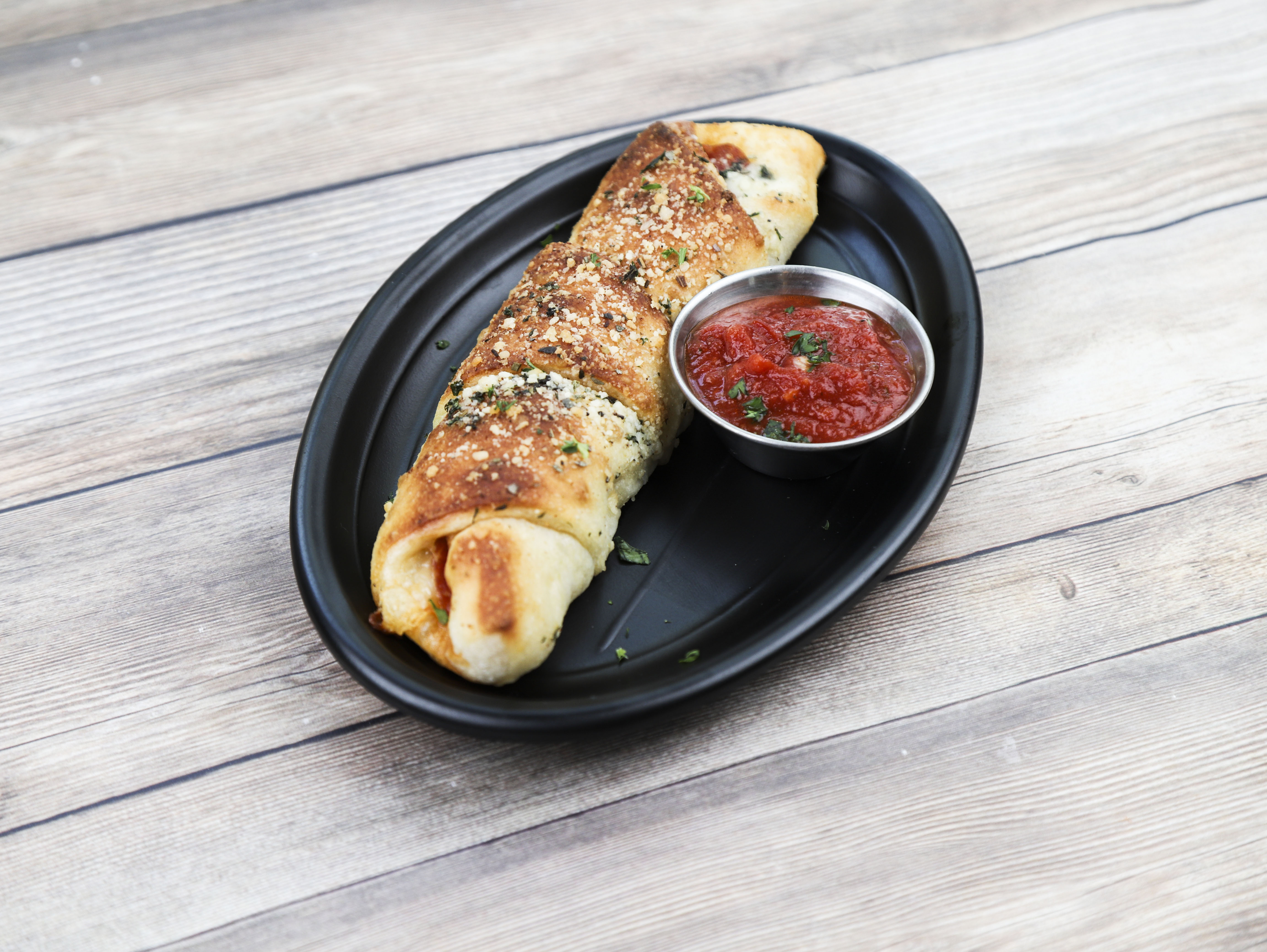 Order Small Spinach Roll food online from Italian Village Pizza store, Orlando on bringmethat.com