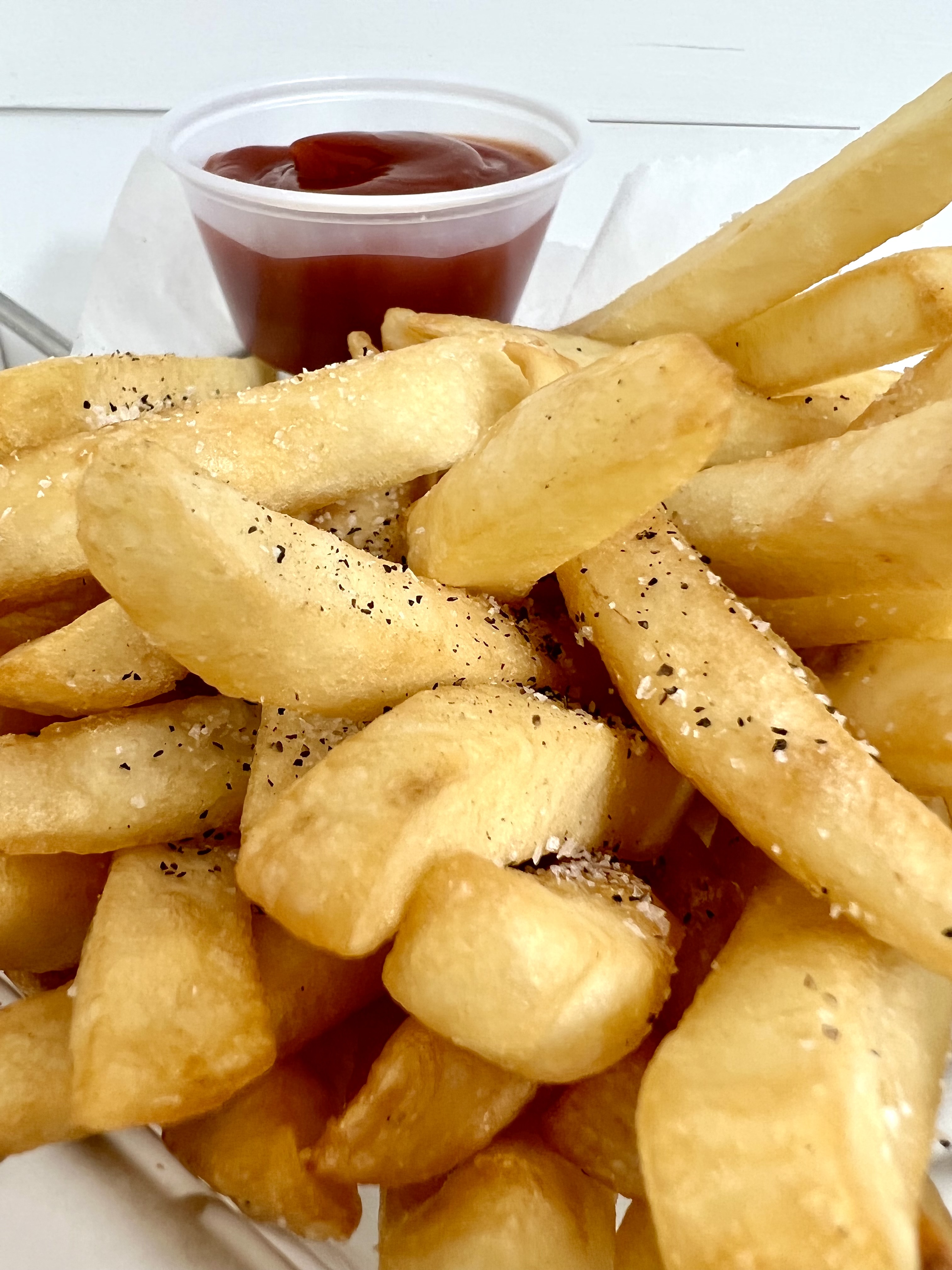 Order French Fries food online from Mambo Empanadas store, Rutherford on bringmethat.com