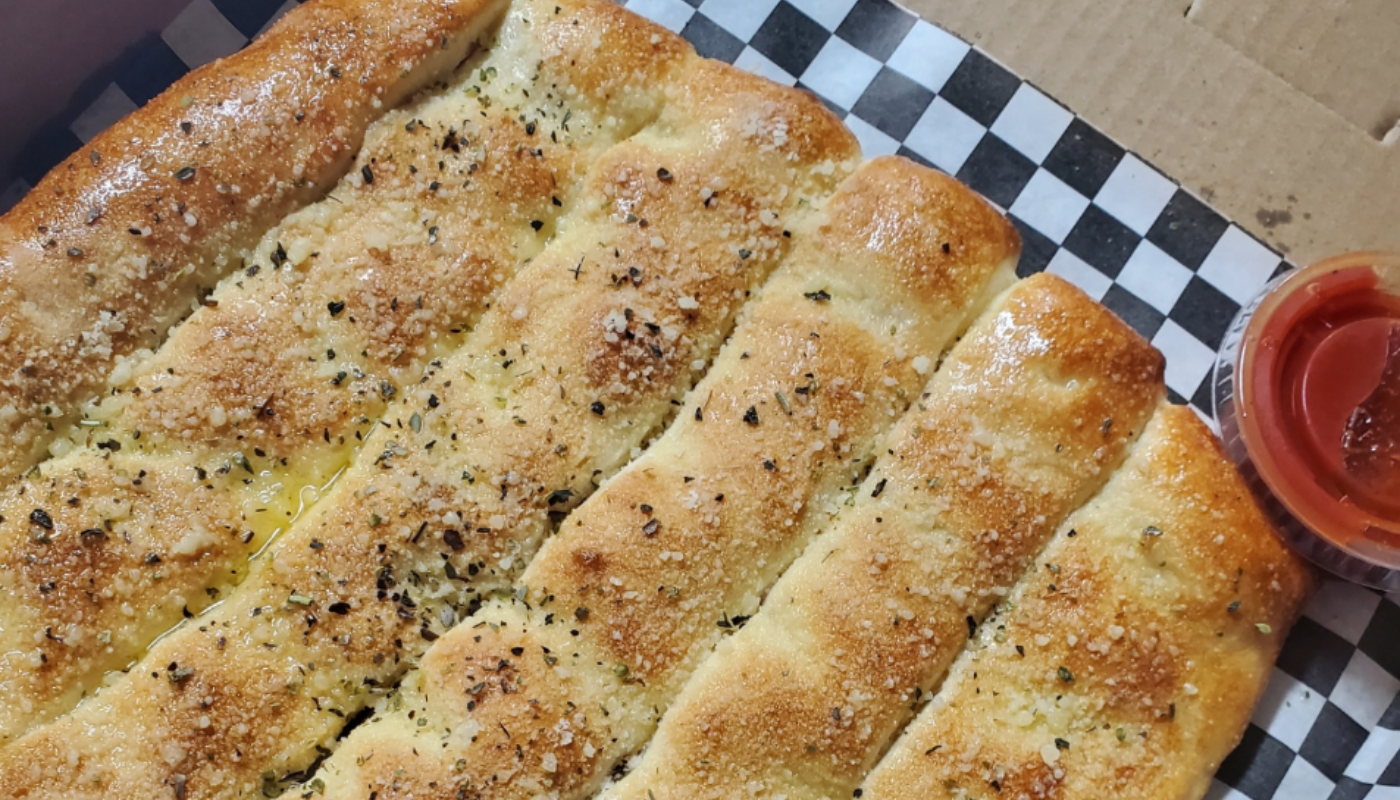 Order Garlic Breadsticks food online from Ricky's Pizza store, Los Angeles on bringmethat.com