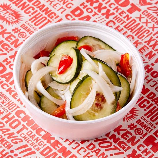 Order Cucumber & Onion Salad food online from Nashbird store, Edmond on bringmethat.com