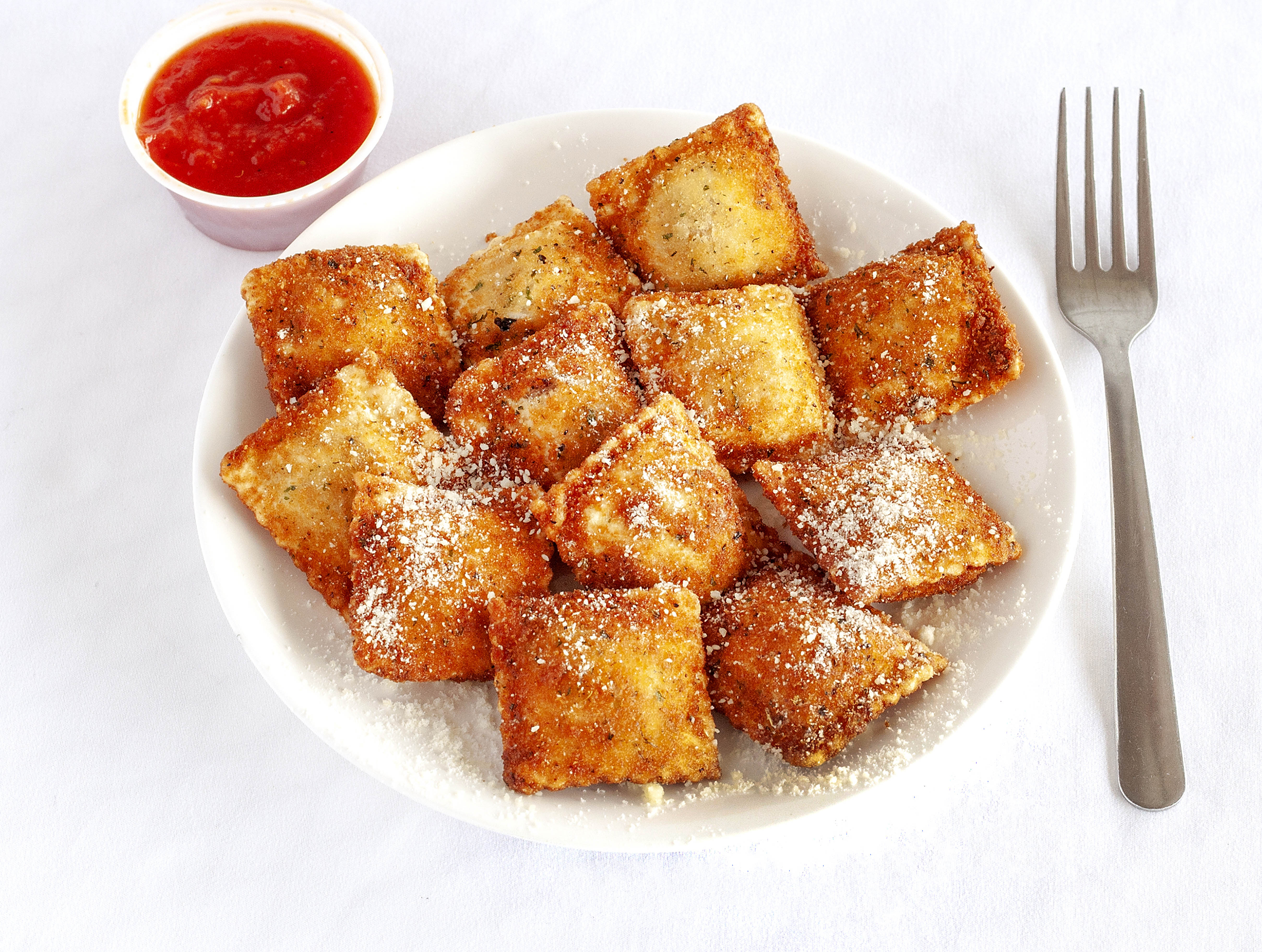 Order 12 Toasted Ravioli food online from The Italian Village store, Columbia on bringmethat.com