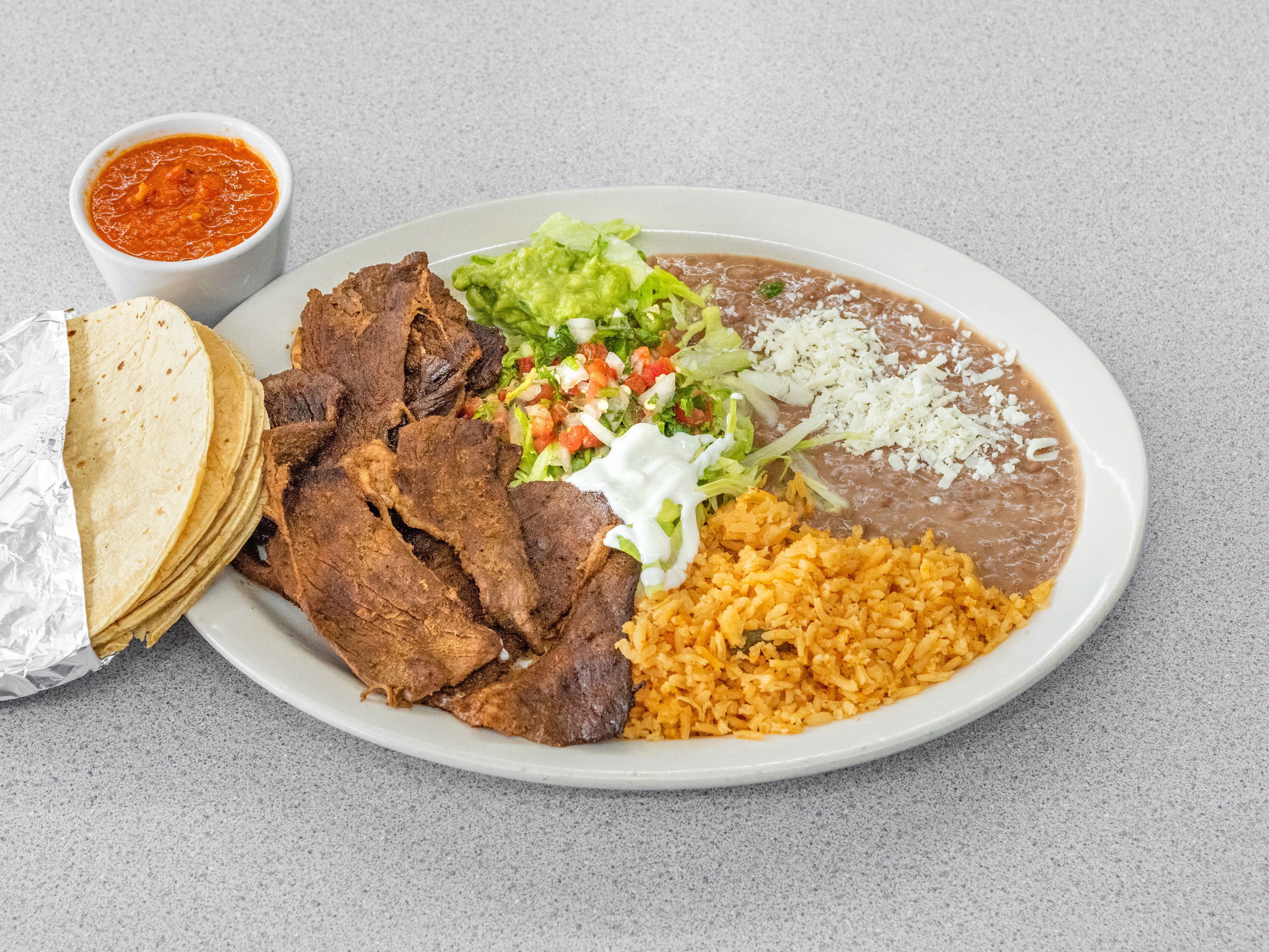 Order Carne Azada food online from Luna Mexican Rotiserrie store, Louisville on bringmethat.com