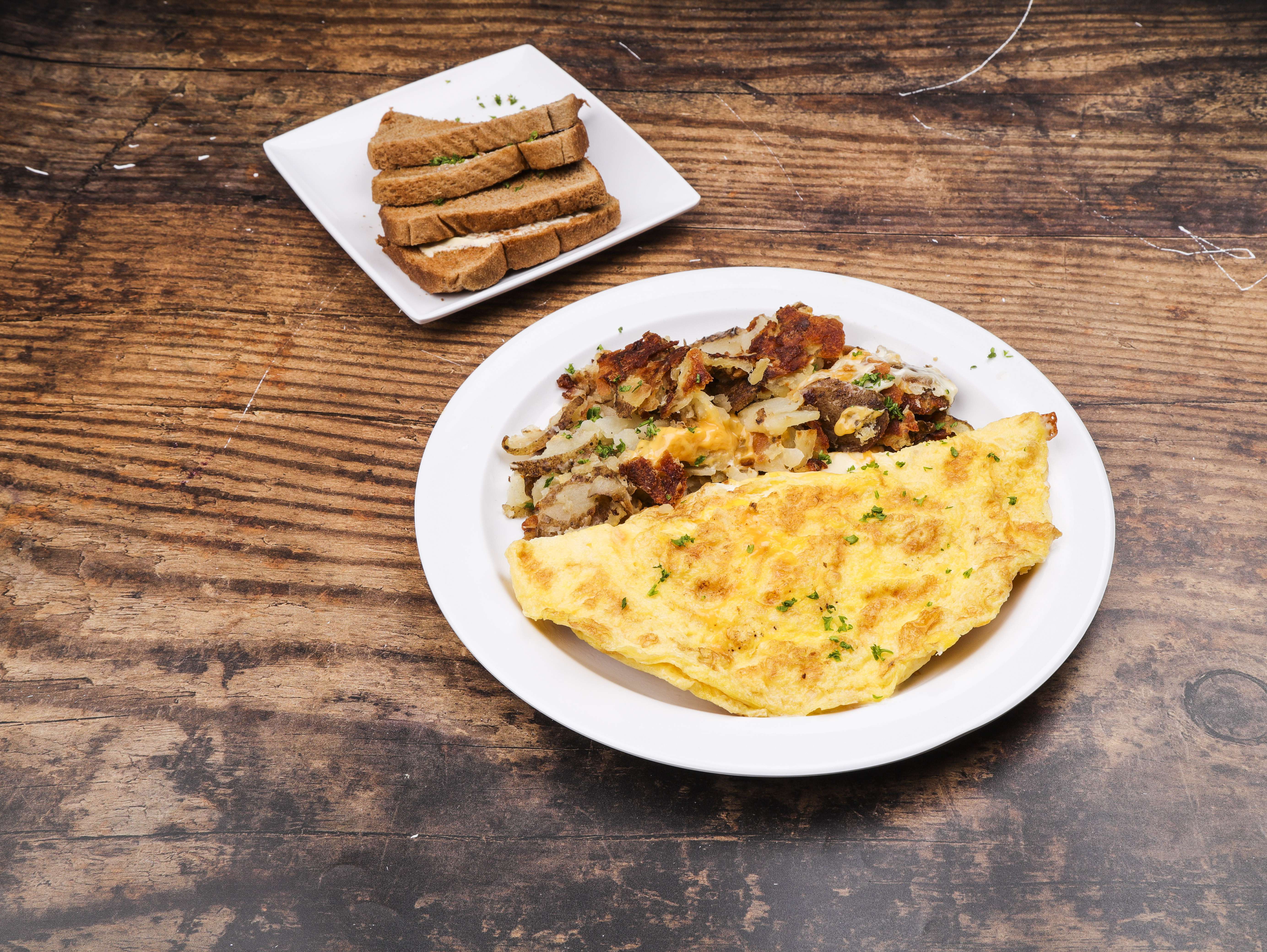 Order 4 Cheese Breakfast Omelette food online from Sam's Diner store, Maumee on bringmethat.com