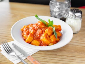 Order Gnocchi Alexsandro food online from Pasta Party store, Orange on bringmethat.com