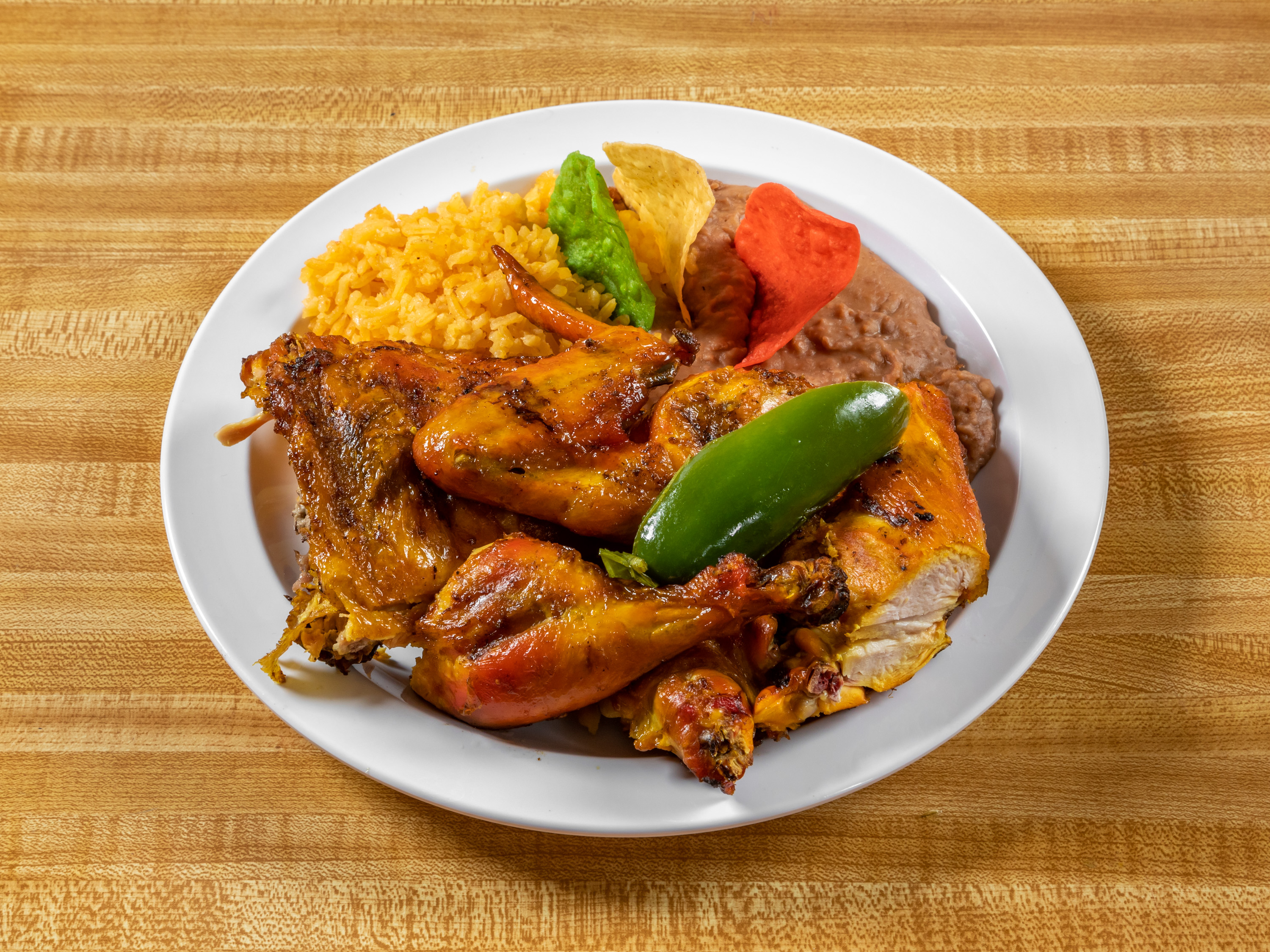 Order 4 Piece Chicken Combo with 2 Sides food online from Don Jacinto Pollo Grill store, Santa Ana on bringmethat.com