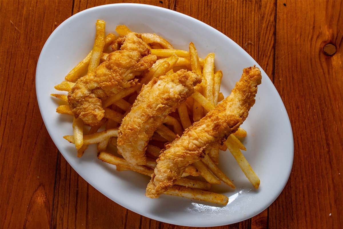 Order Kid's Chicken food online from Boudreaux's Cajun Kitchen store, Houston on bringmethat.com