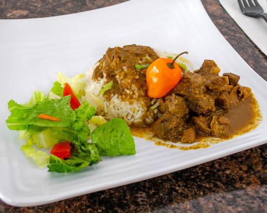 Order Curry Goat food online from Rise Caribbean Catering store, East Orange on bringmethat.com