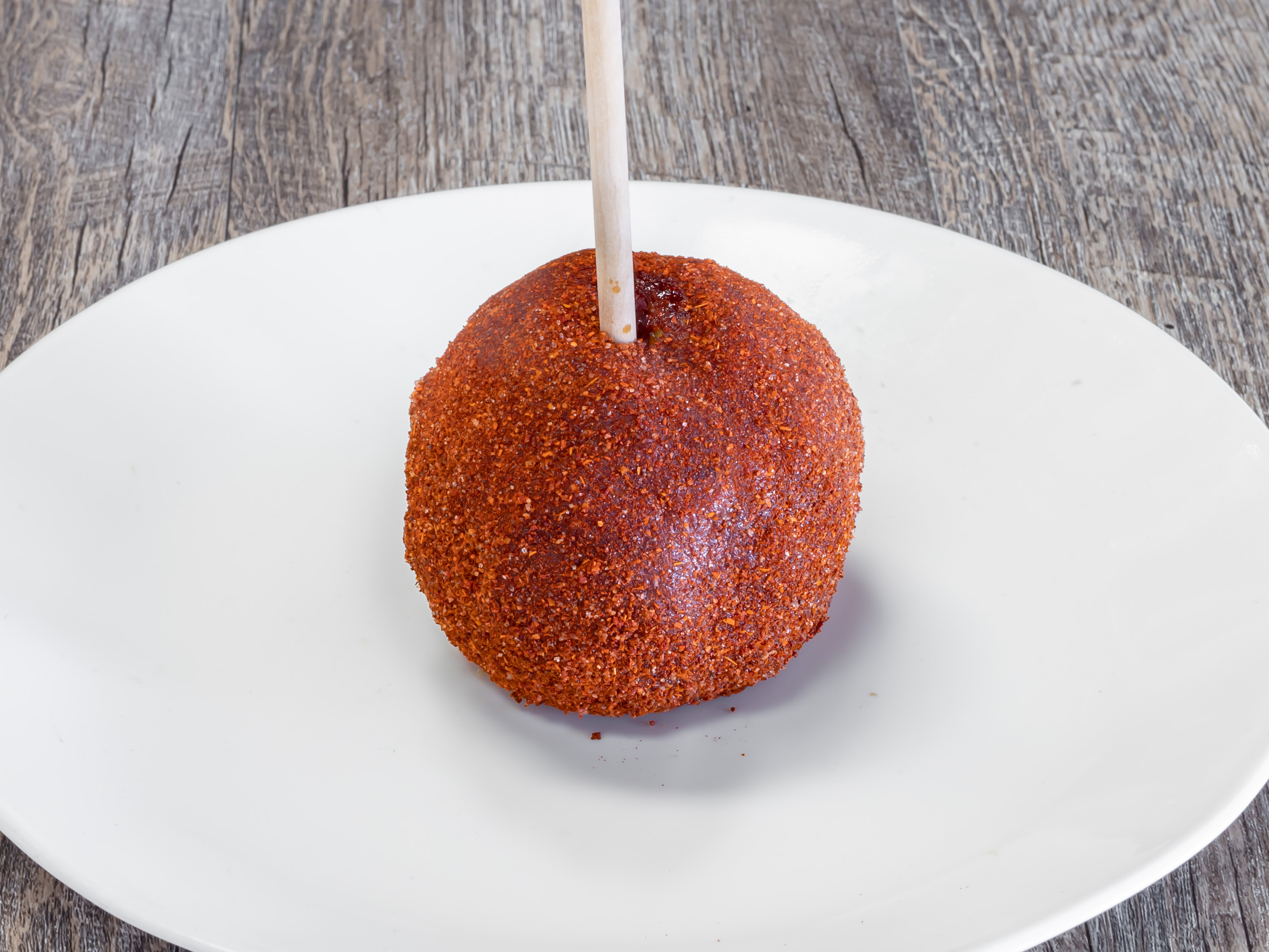 Order Tamarindo Apple food online from Rocky Mountain Chocolate Factory store, Houston on bringmethat.com