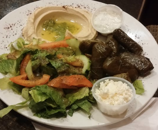 Order Veg Grape Leaves Plate food online from Mona's Cafe store, New Orleans on bringmethat.com