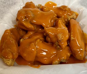 Order JUMBO PARTY WINGS (1st and 2nd joint) food online from J's Fish & Chicken store, Kansas City on bringmethat.com