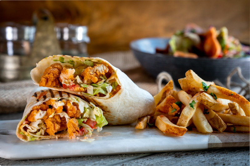 Order Hot N' Spicy Chicken Wrap  food online from The Butcher Grille store, Dearborn on bringmethat.com