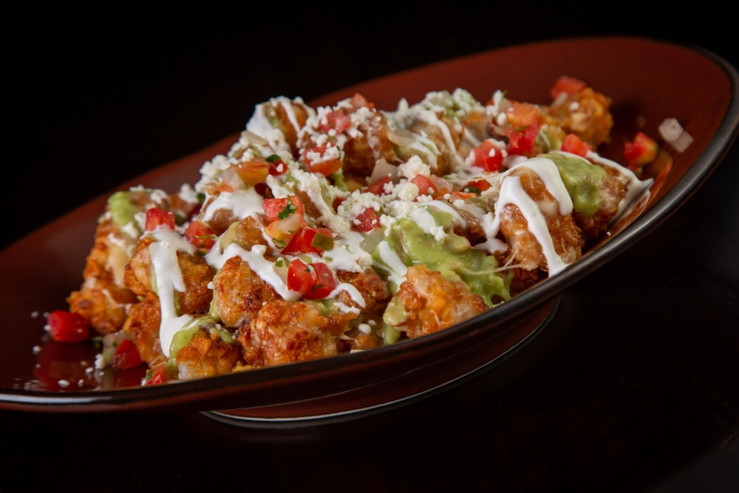 Order Totchos food online from Hussongs Cantina store, Las Vegas on bringmethat.com