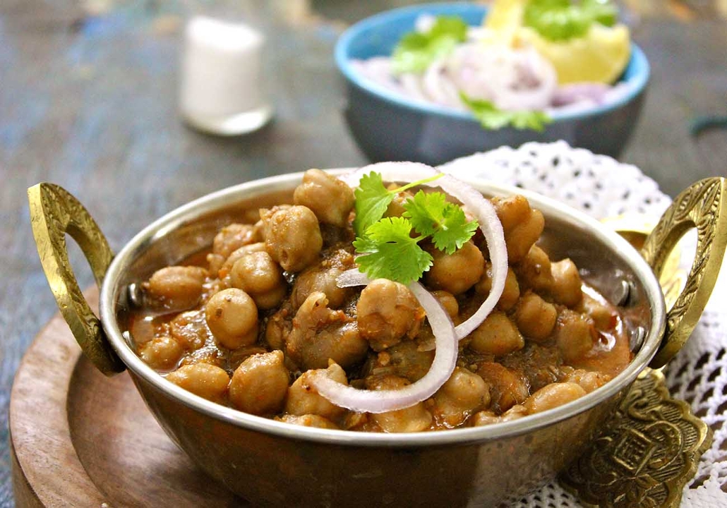 Order Peshwari Channa food online from India Oven store, Roseville on bringmethat.com