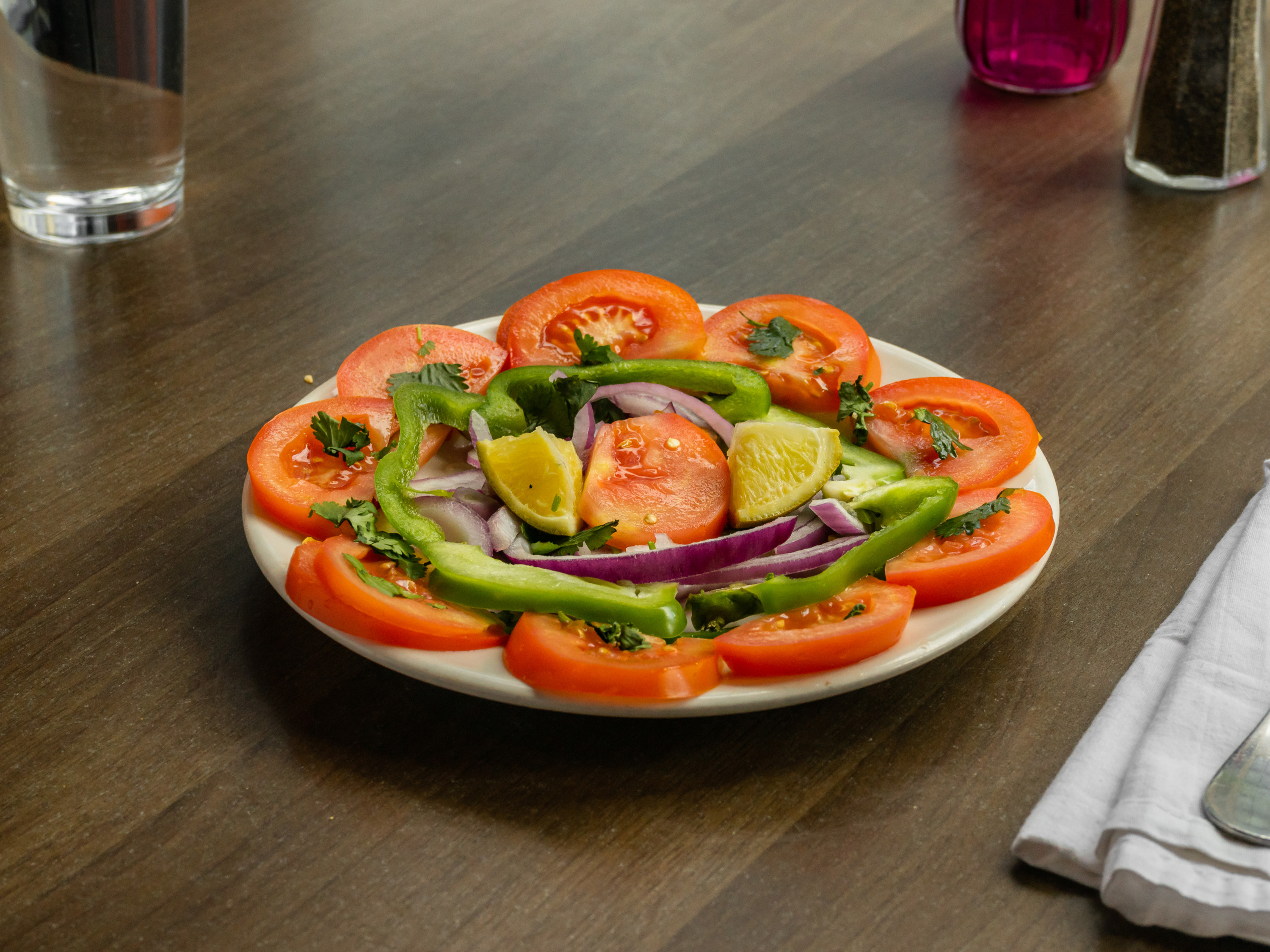 Order Onion and Tomato Salad food online from Zaika India Cuisine store, San Francisco on bringmethat.com