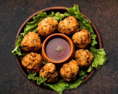 Order Crisp Veggie Fritters food online from Ministry of Curry store, Florence on bringmethat.com