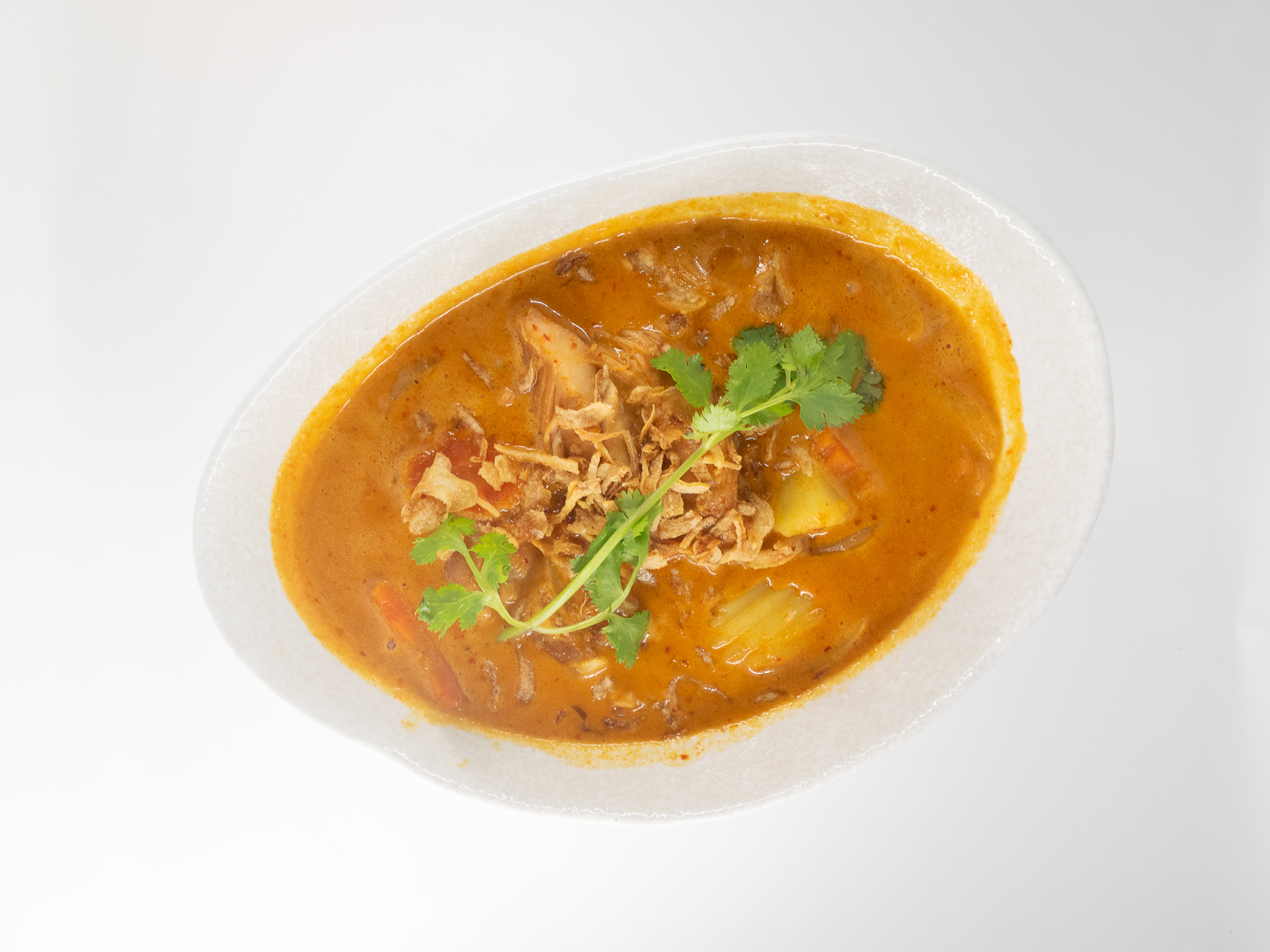 Order Mussamun Curry Chicken food online from Karakade Thai Cuisine store, Redwood City on bringmethat.com