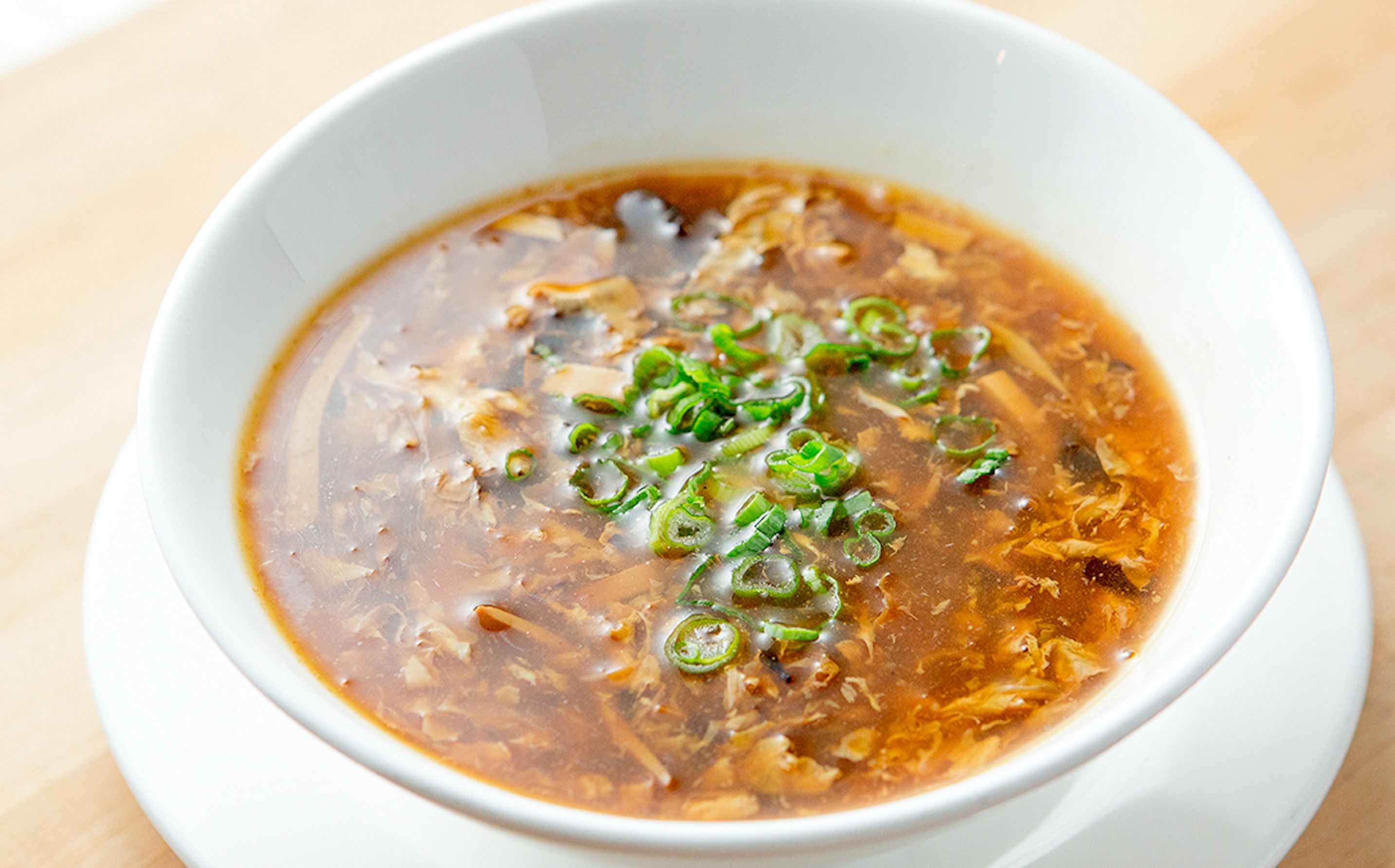 Order Hot & Sour Soup food online from Wokcano - Valencia store, Valencia on bringmethat.com