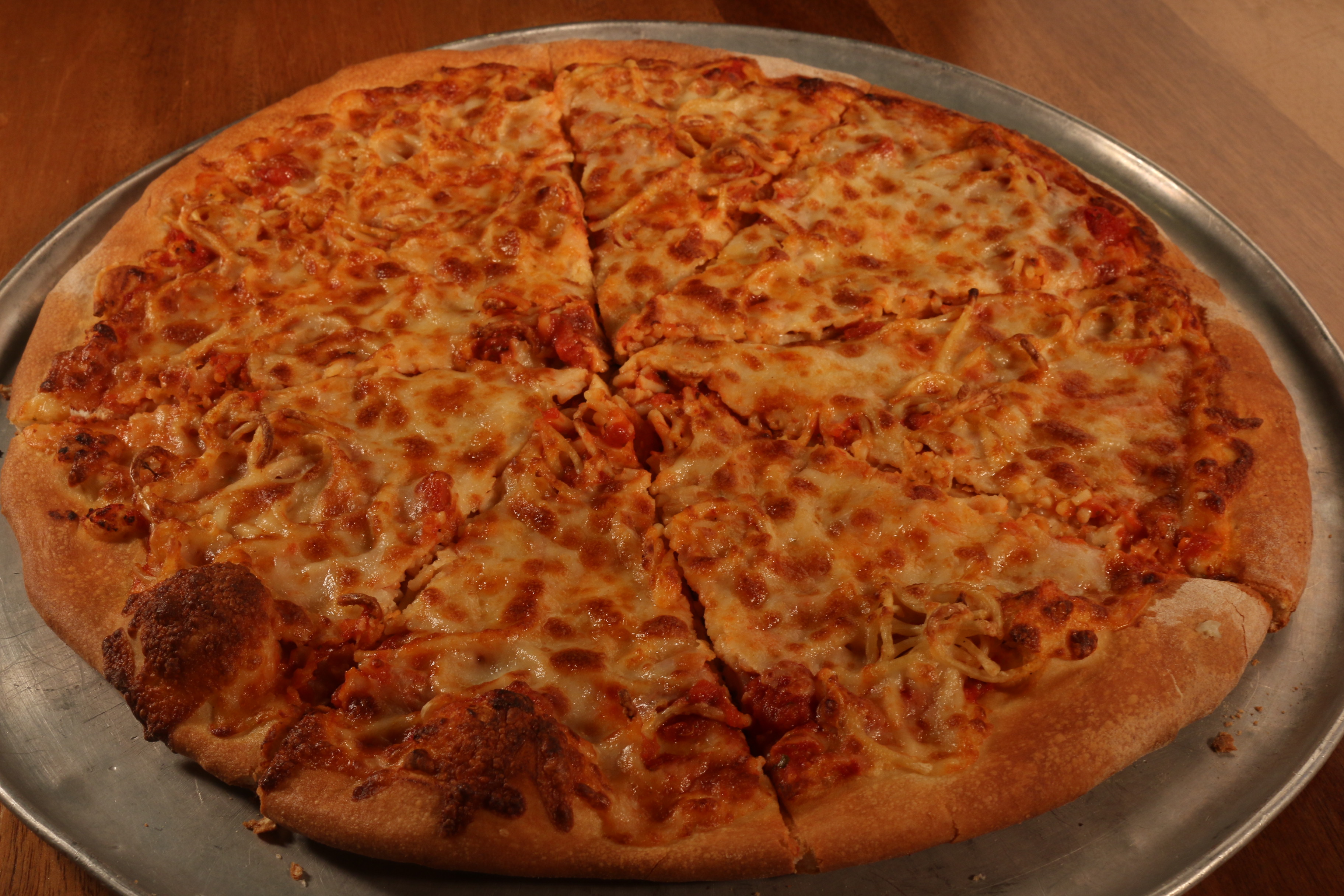 Order Spaghetti Pizza food online from UnCommon Pizza store, Lititz on bringmethat.com