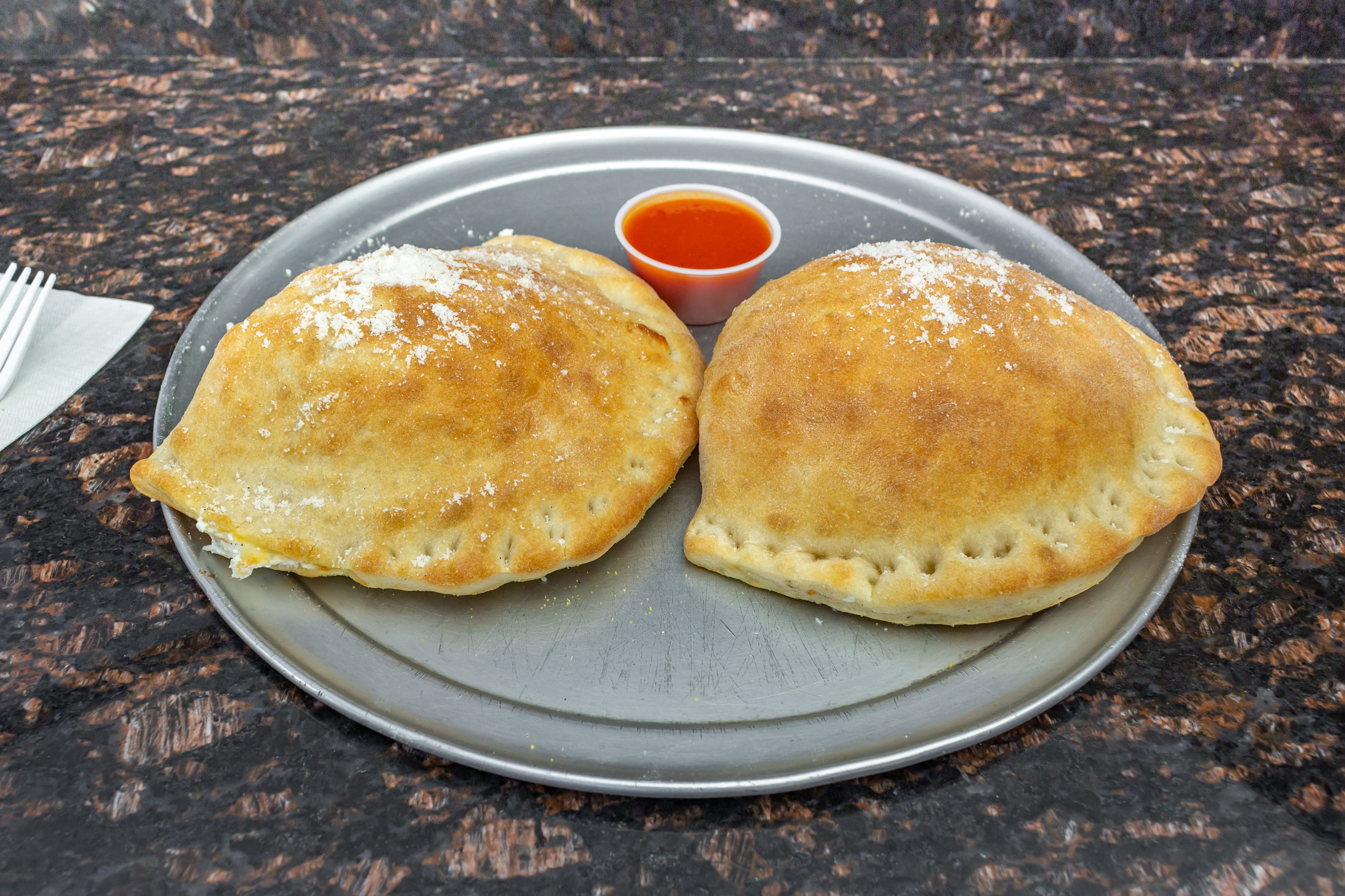 Order Cheese Calzone - Calzone food online from Angelo Pizzeria store, Bogota on bringmethat.com
