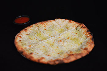 Order Pesto Cheese Flat Bread food online from Strong's Brick Oven Pizzeria store, Hebron on bringmethat.com