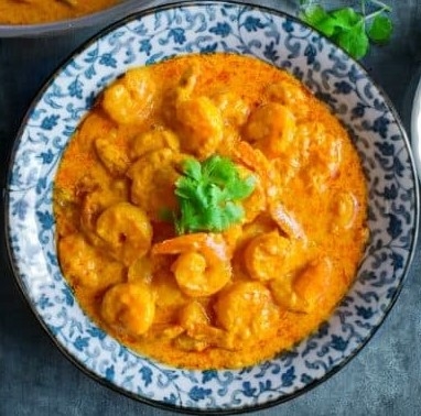 Order Jhinga Malai Curry food online from India Oven store, Roseville on bringmethat.com
