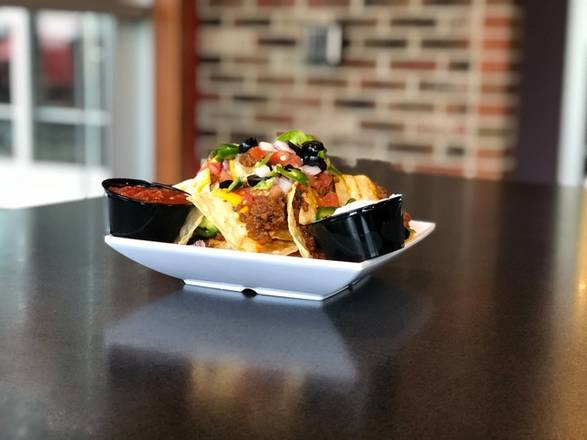 Order Deluxe Nachos food online from Monk's Bar & Grill store, Middleton on bringmethat.com