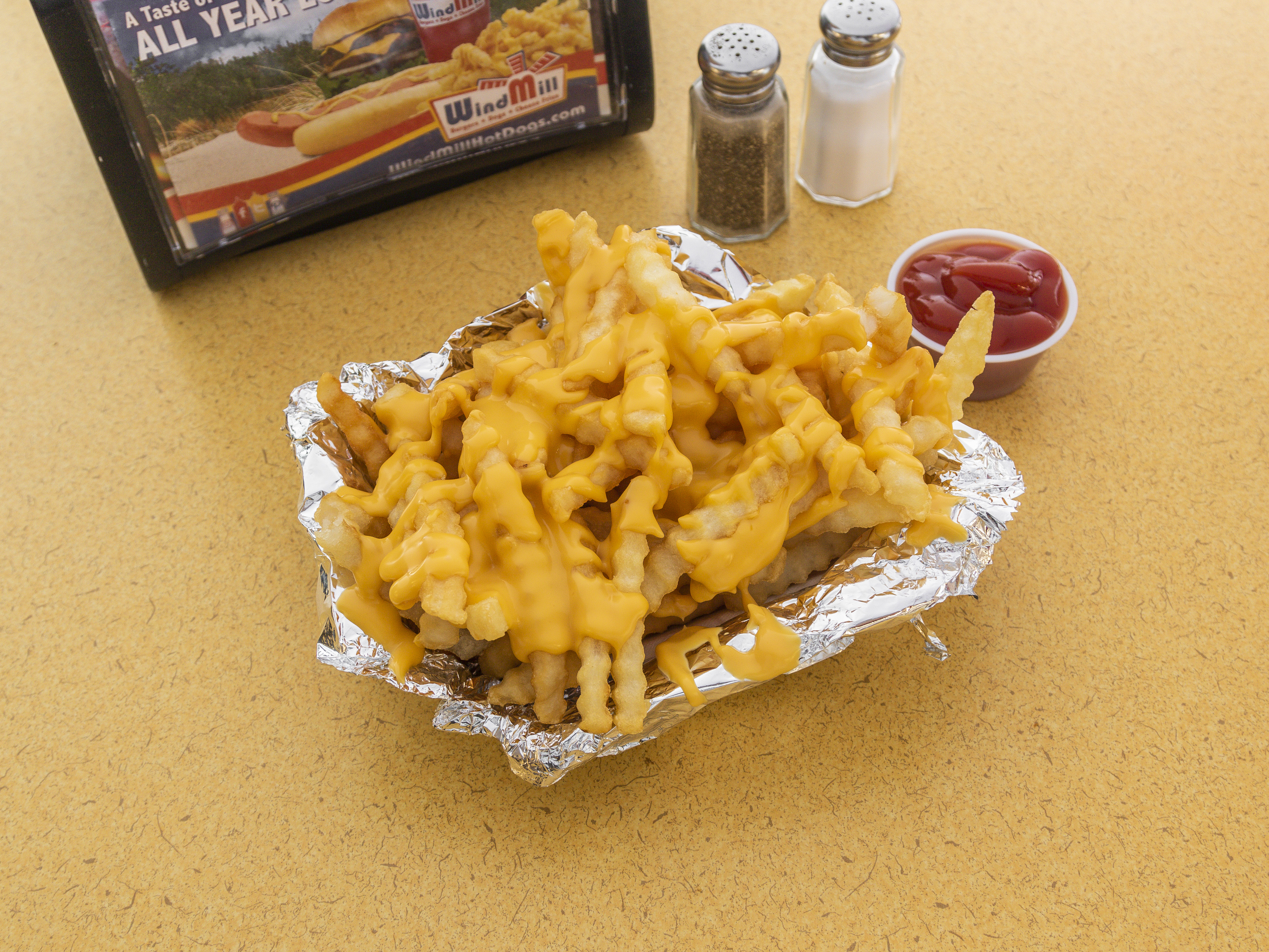 Order Cheese Fries food online from Windmill Gourmet Fast Foods store, Long Branch on bringmethat.com
