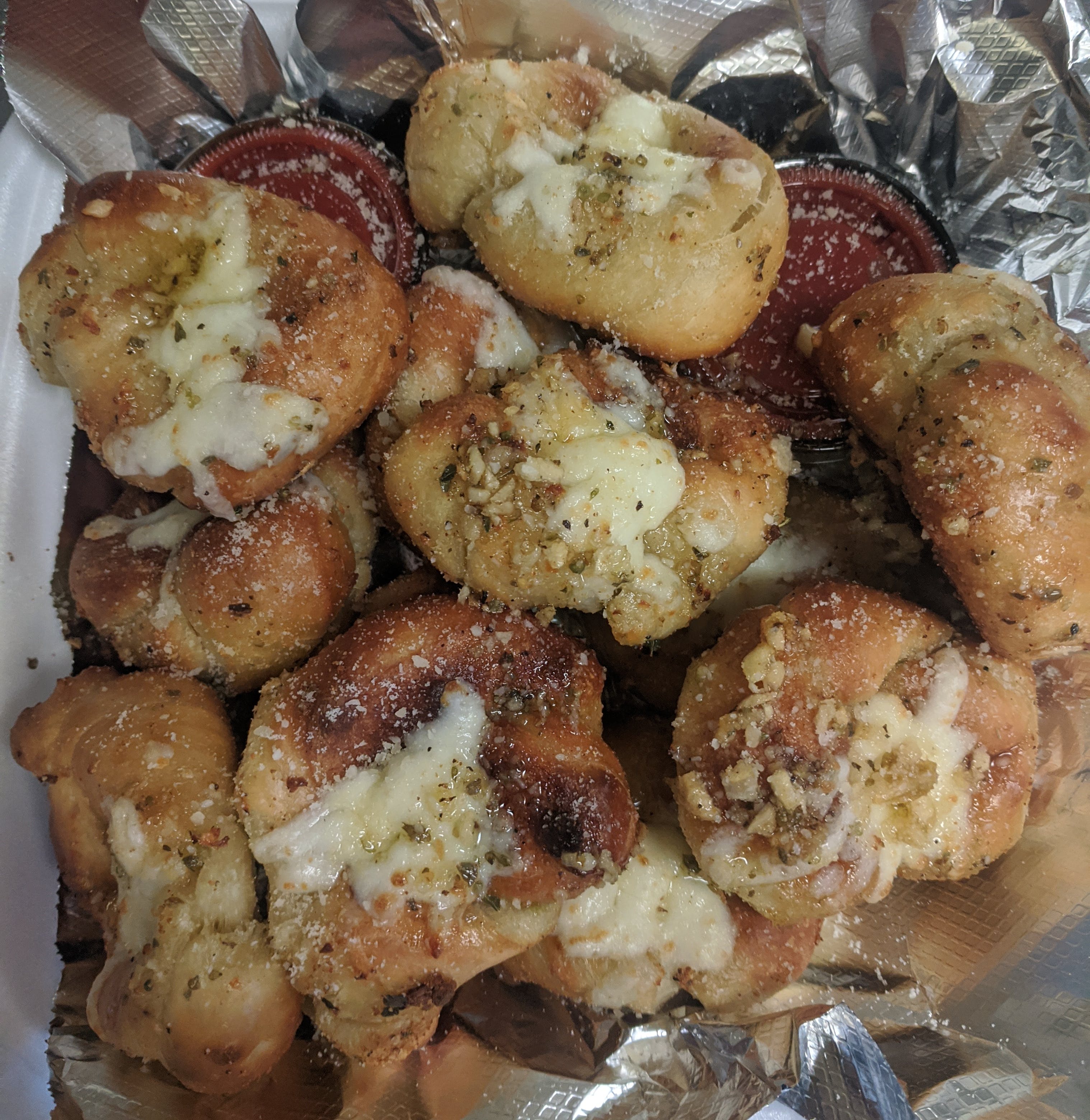 Order Garlic Knots with Cheese - Half Order (6 Pieces) food online from Bella Pizza & Pasta store, Mesa on bringmethat.com