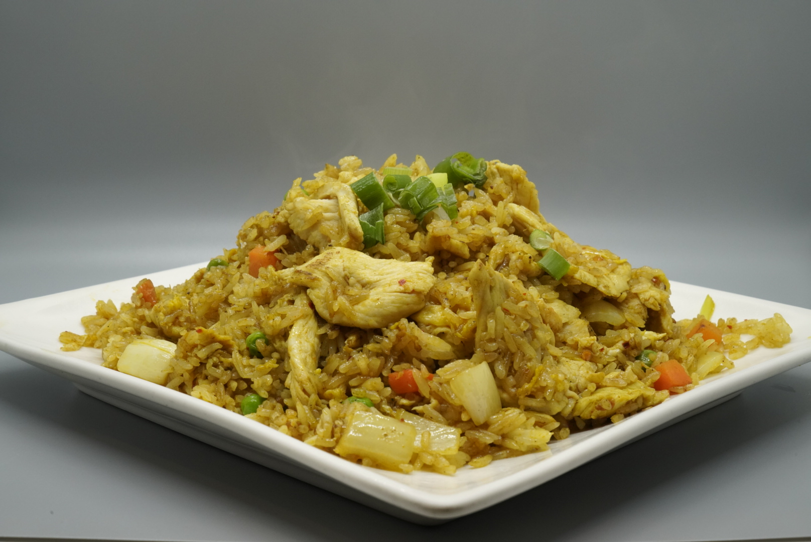 Order 64. Curry Fried Rice food online from Royal Orchid Thai Restaurant store, Riverside on bringmethat.com