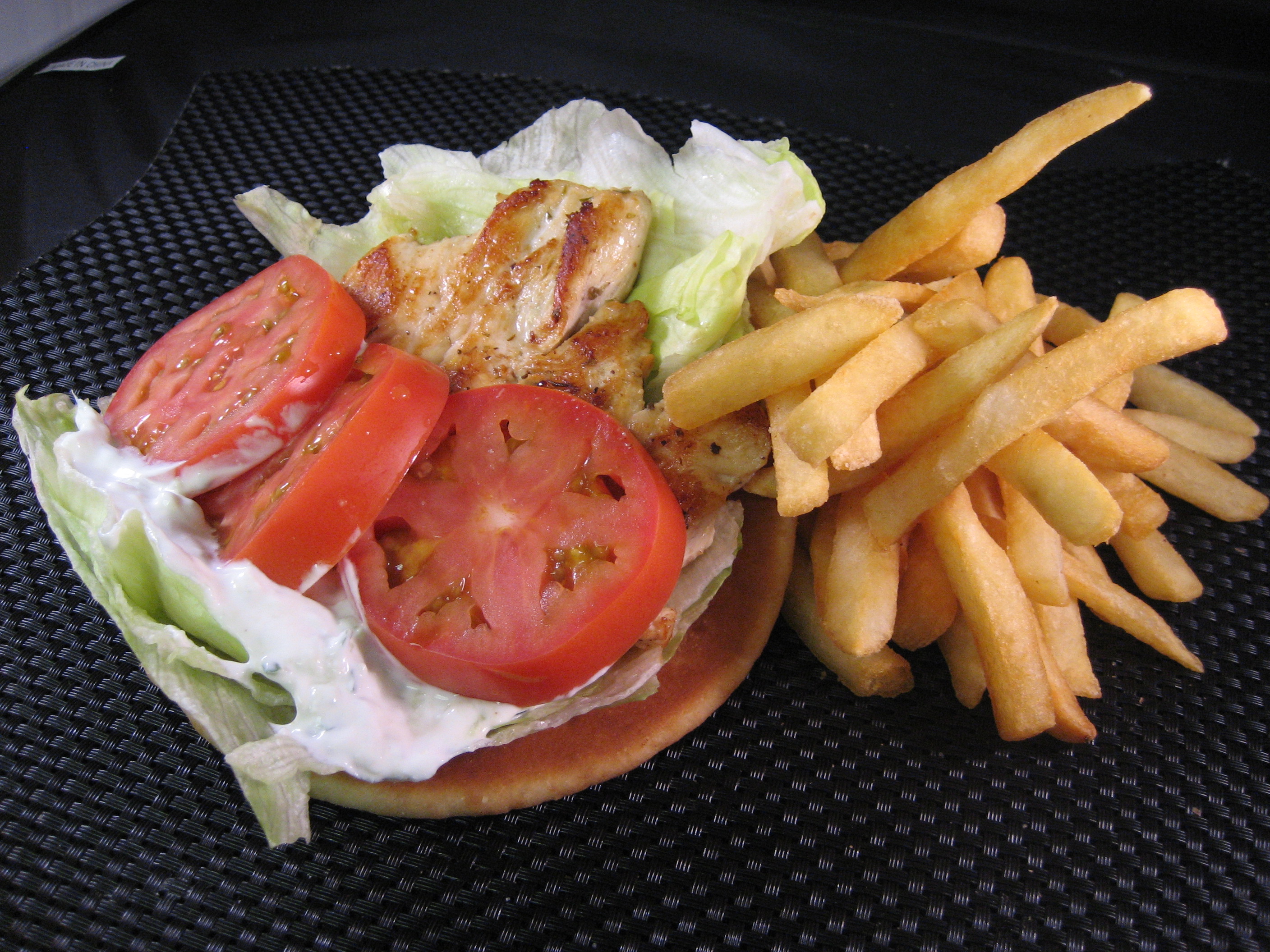 Order Grilled Grecian Chicken Breast Sandwich food online from George's hot dogs store, Chicago on bringmethat.com
