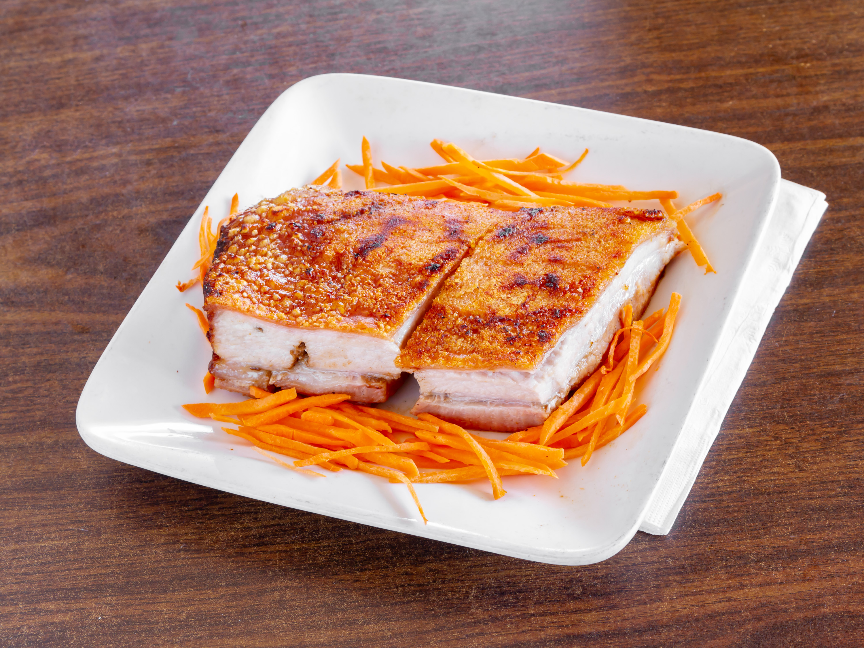 Order 1 lb Roasted Pork food online from Old Peking Chinese Restaurant store, Tucson on bringmethat.com