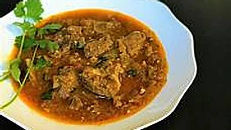 Order Goat Curry food online from Gumagumalu store, Fremont on bringmethat.com