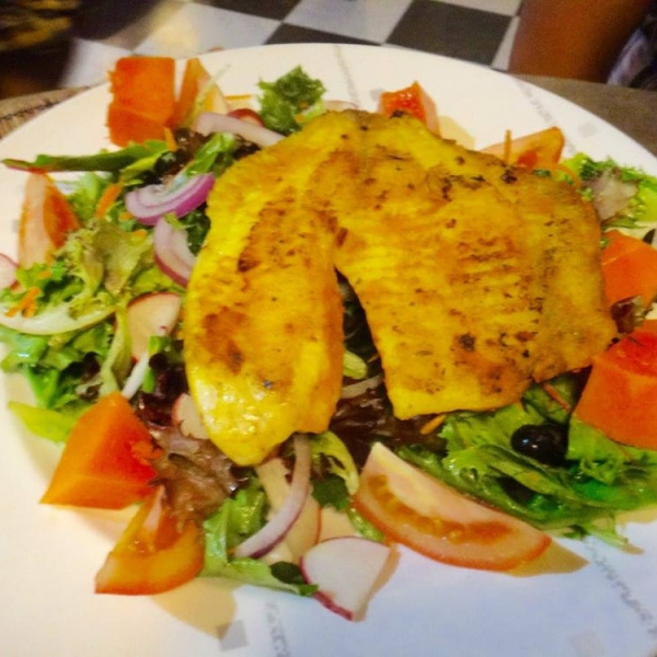Order Talapia African Garden Salad food online from Flavors of East Africa store, San Diego on bringmethat.com