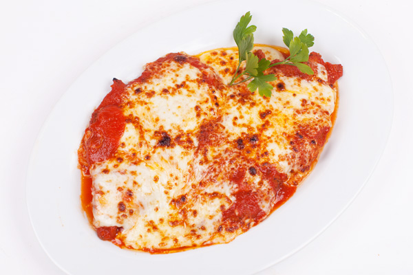 Order Veal Parmigiana Entree food online from Umberto Pizzeria store, Bellmore on bringmethat.com