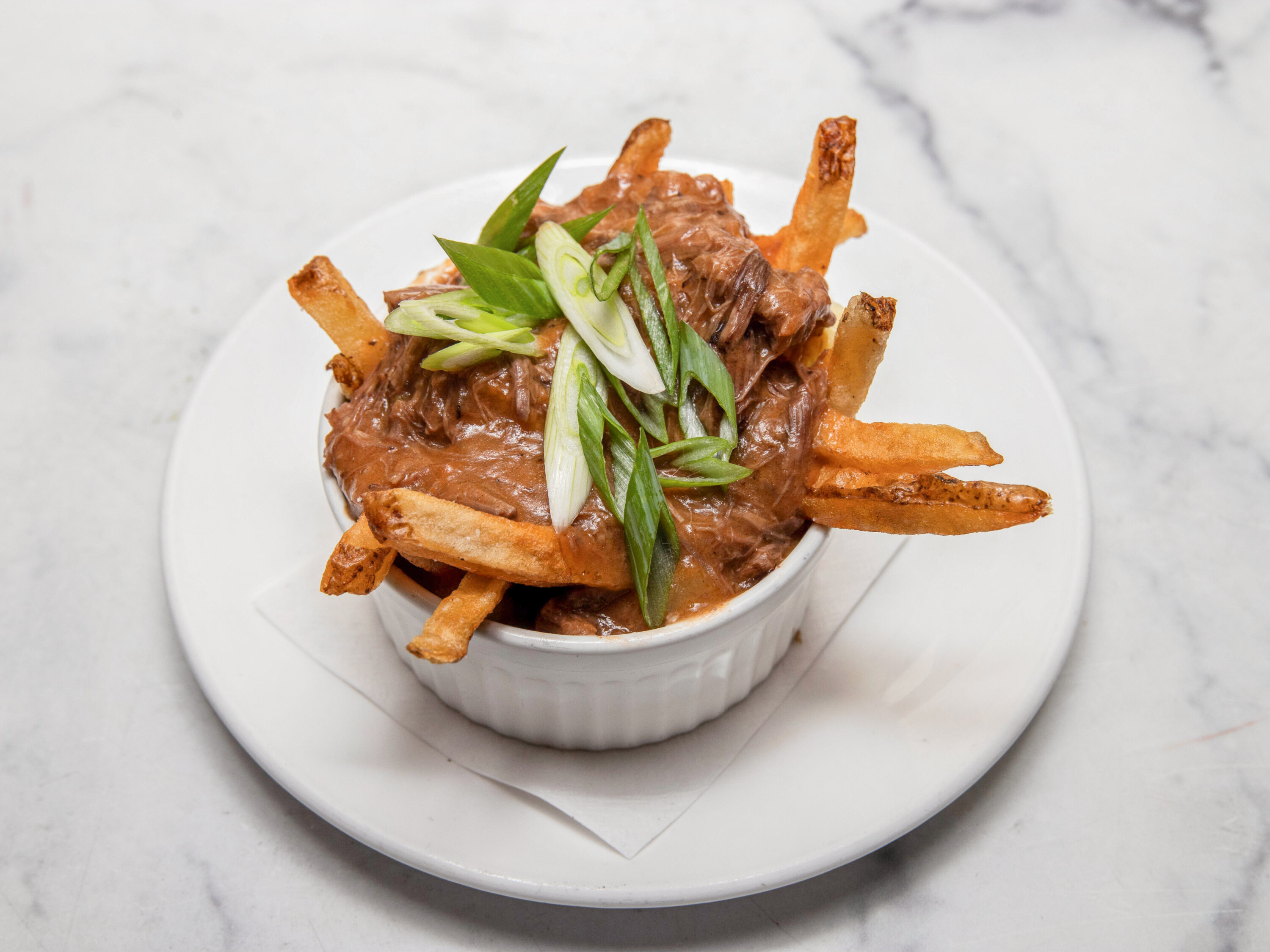 Order Braised Duck Poutine food online from The Warren store, New York on bringmethat.com