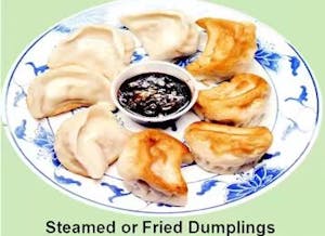 Order 5. Fried or Steamed Dumplings (8) 锅贴或水饺 food online from He Rui store, Oklahoma City on bringmethat.com