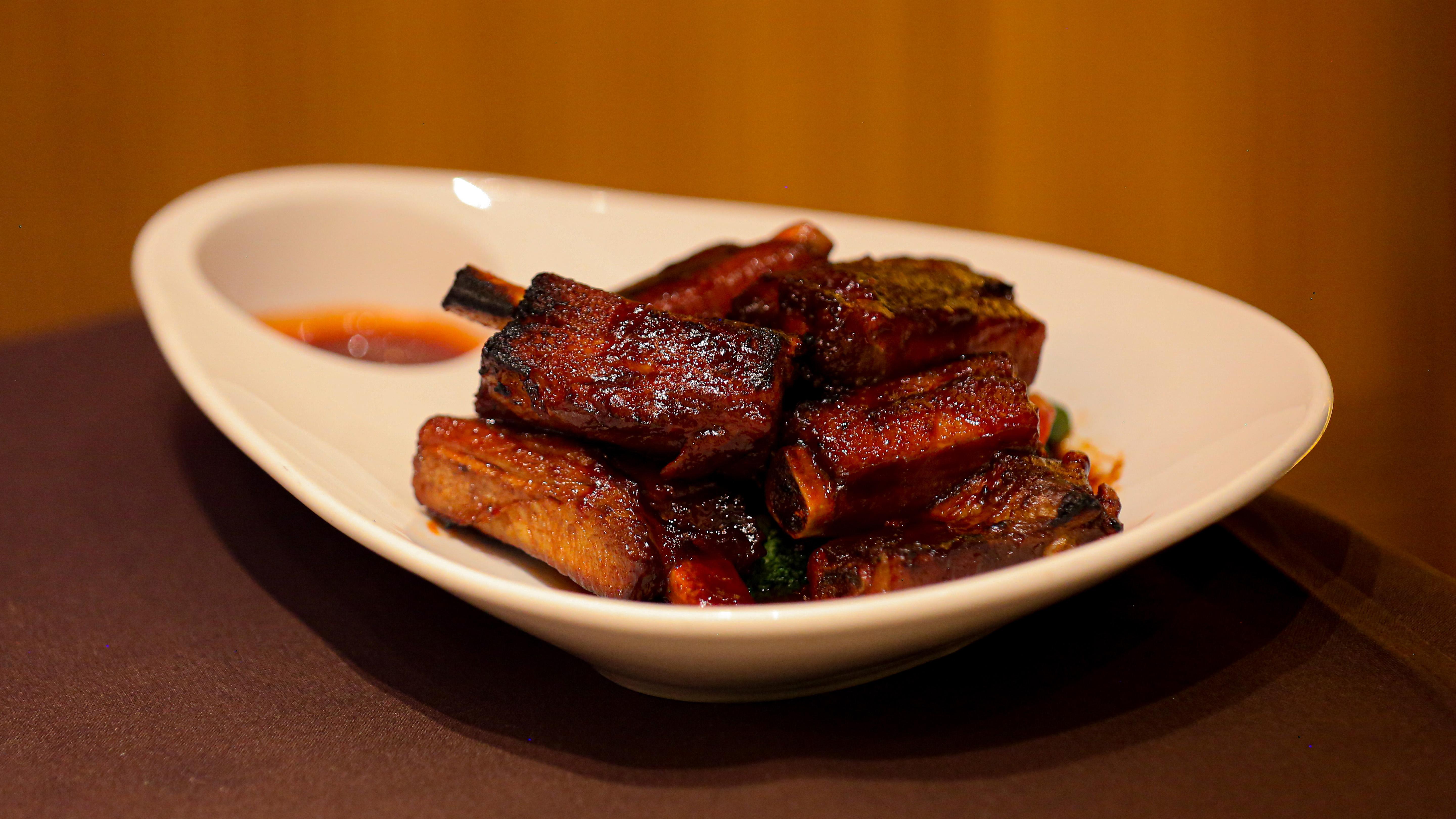 Order Grilled Baby Pork Spare Ribs (8pcs) food online from MoCA Asian Bistro - Queens store, Forest Hills on bringmethat.com