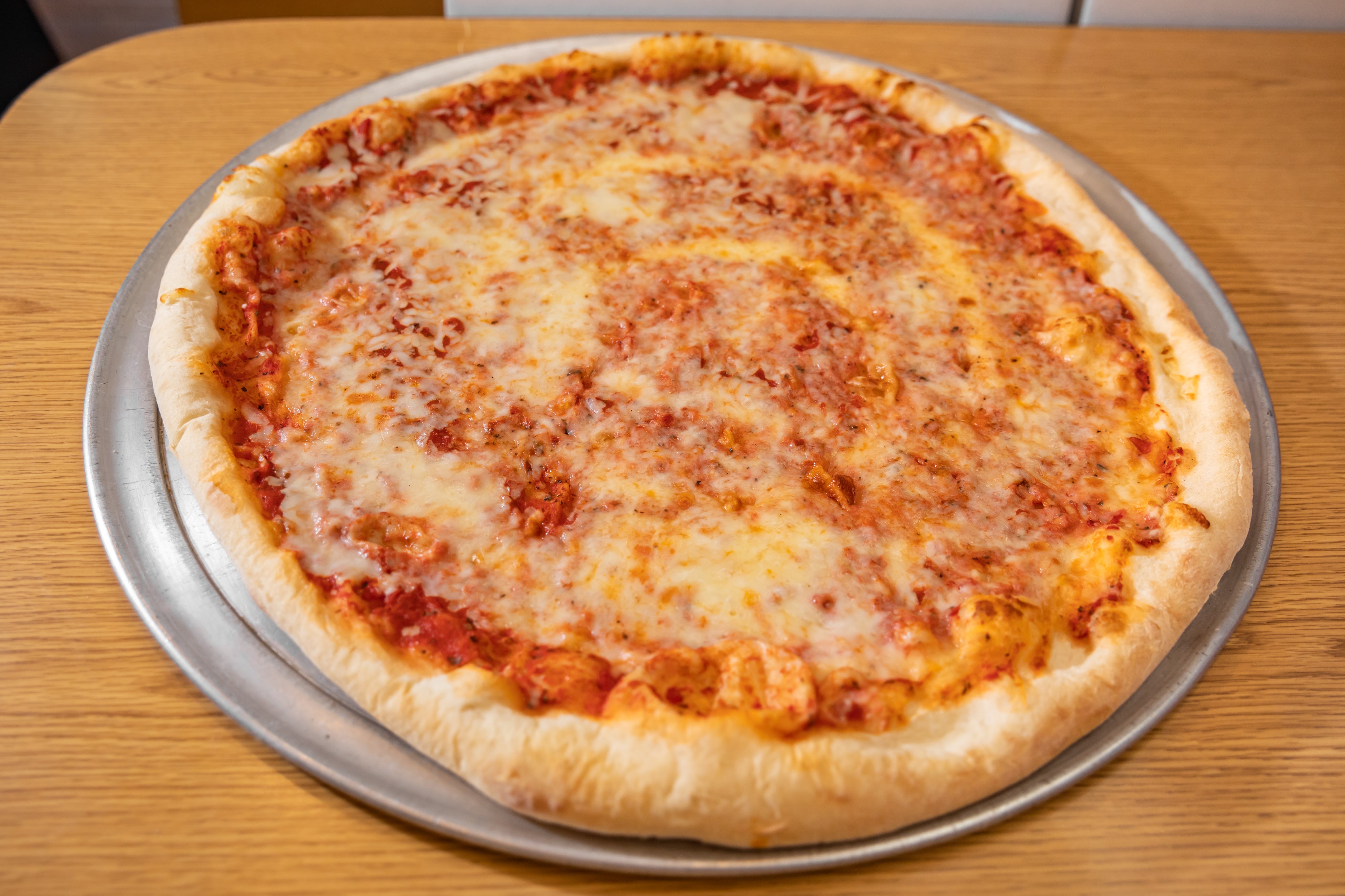 Order Cheese Pizza - 14" (8 Slices) food online from Milano's Pizza store, Collierville on bringmethat.com