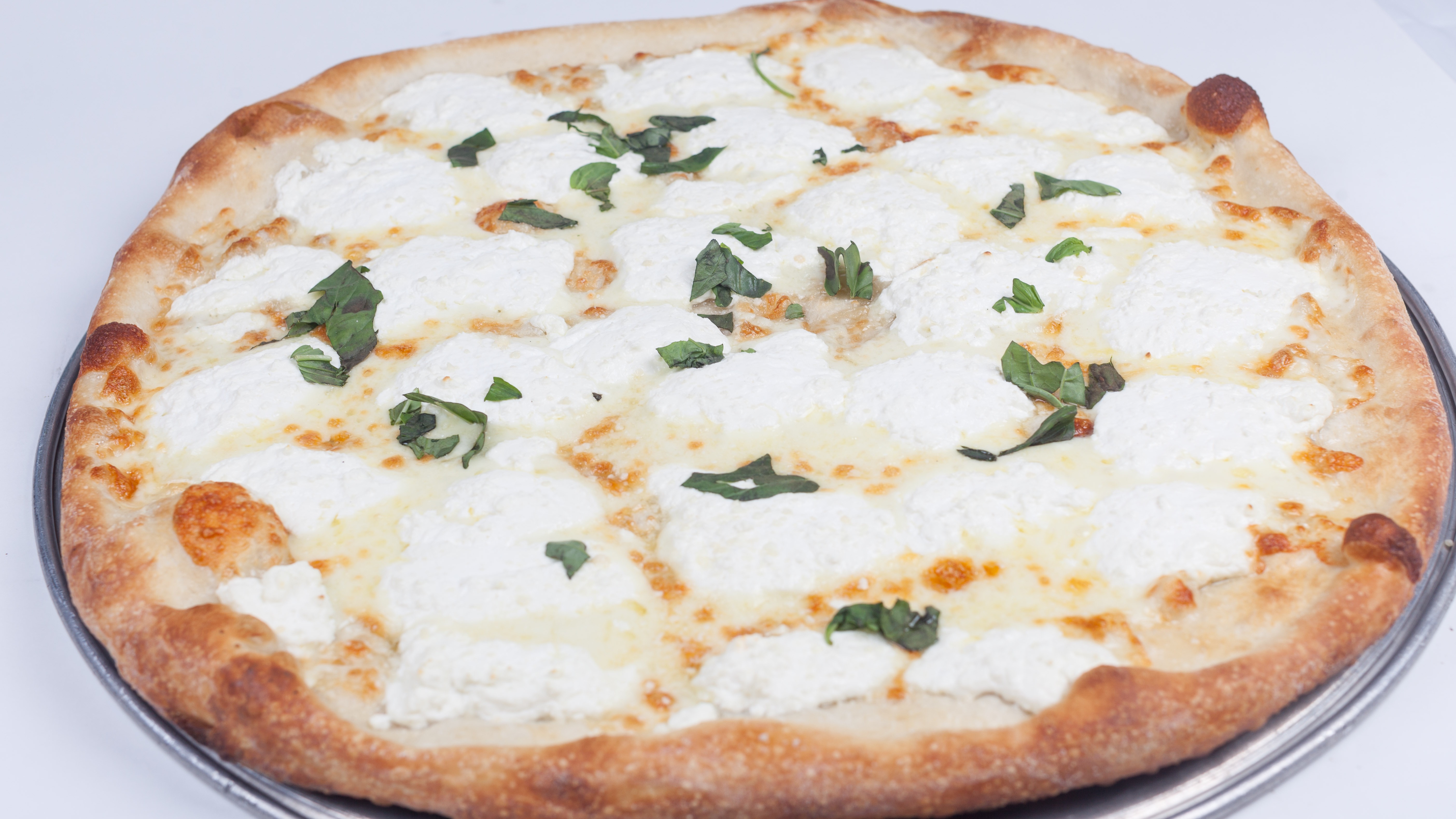 Order White Pie food online from Umberto's Pizzeria store, New Hyde Park on bringmethat.com